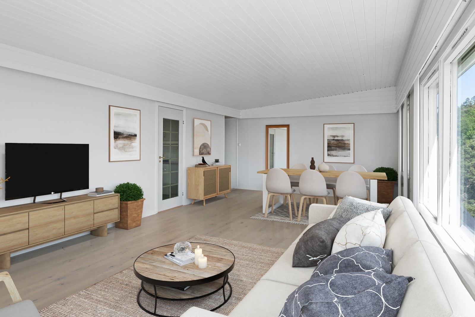 Stuen har både vedovn og varmepumpe. (Bildet er digitalt møblert) Galleribilde