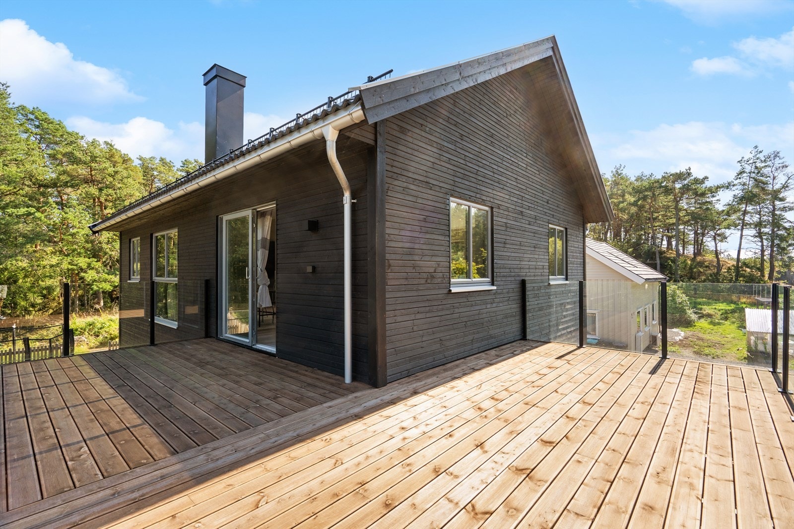 Takterrasse over carport med glass rekkverk Galleribilde
