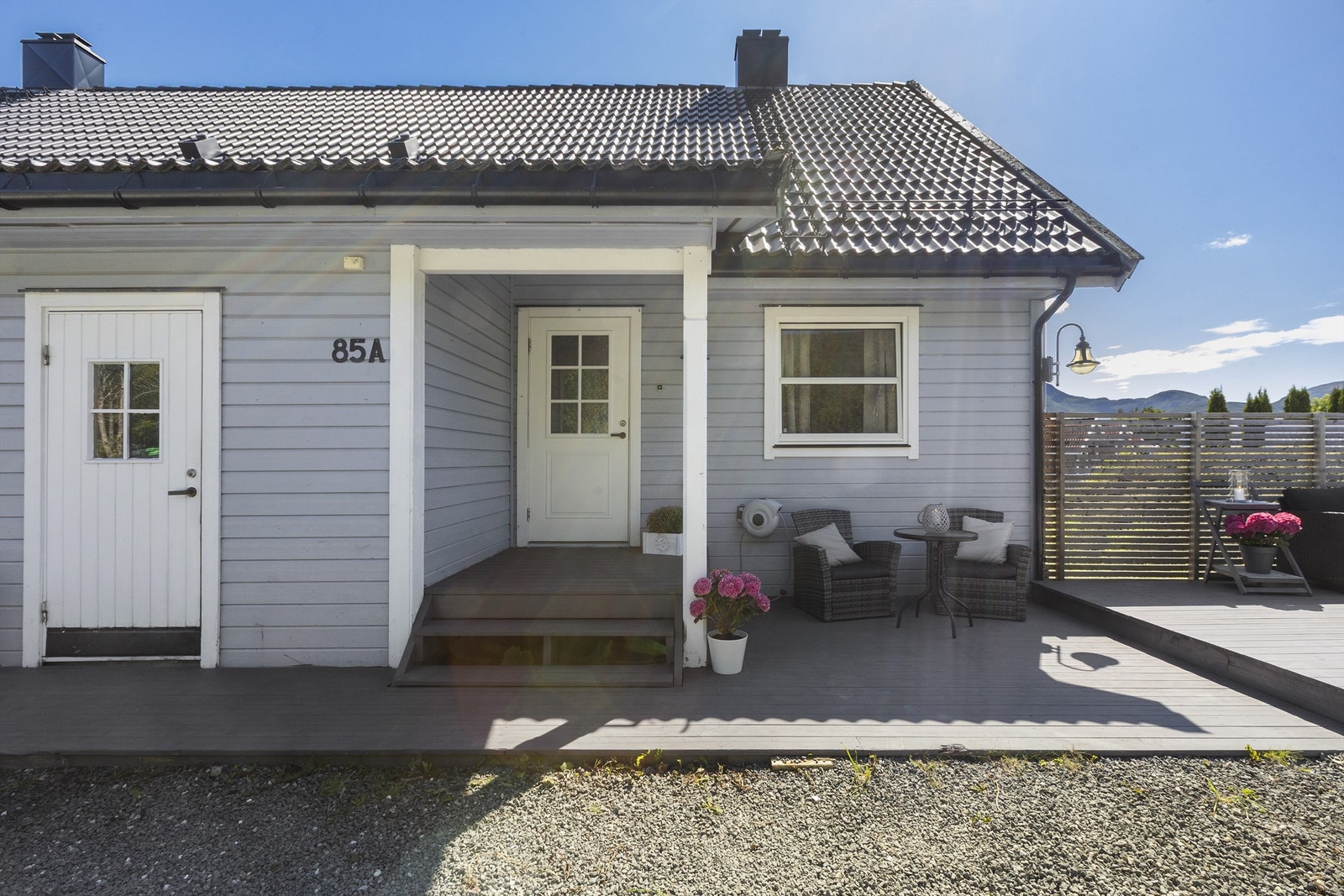 Inngangsparti med sportsbod til venstre Galleribilde