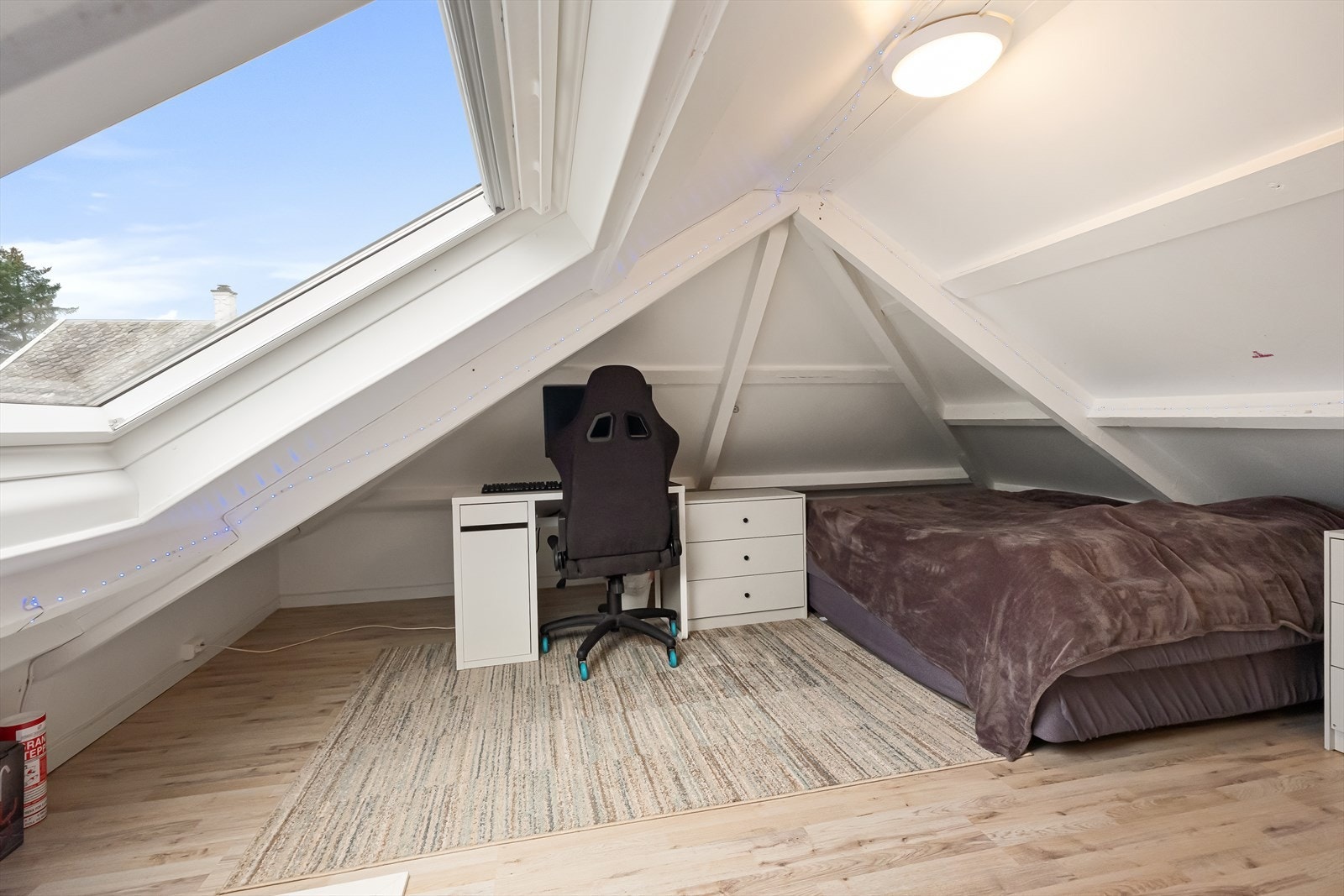 Praktisk loftsetasje Galleribilde