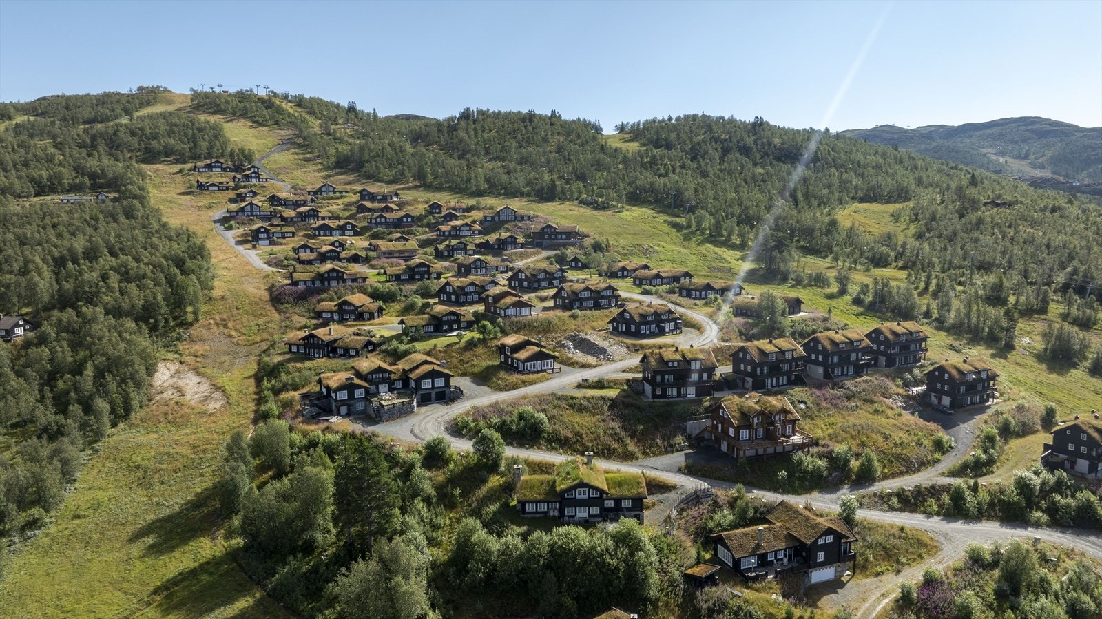 Feltet Vidsyn er omkranset av alpinbakken på begge sider og feltet er gjennomført og godt planlagt med hovedsakelig bygg i laft eller stav, alle med torvtak. Galleribilde