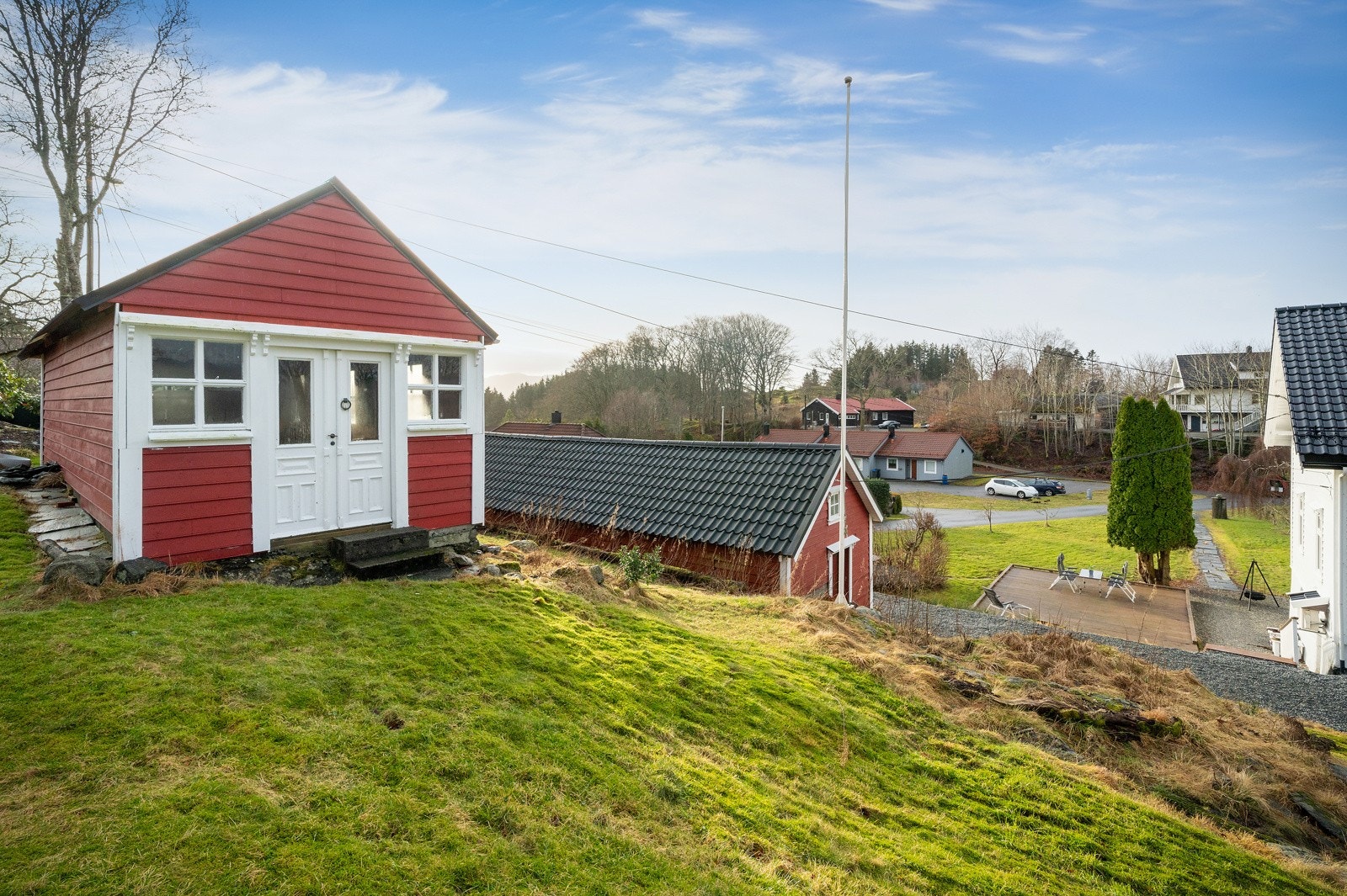 Øverst på tomten finner vi redskapshuset. Galleribilde