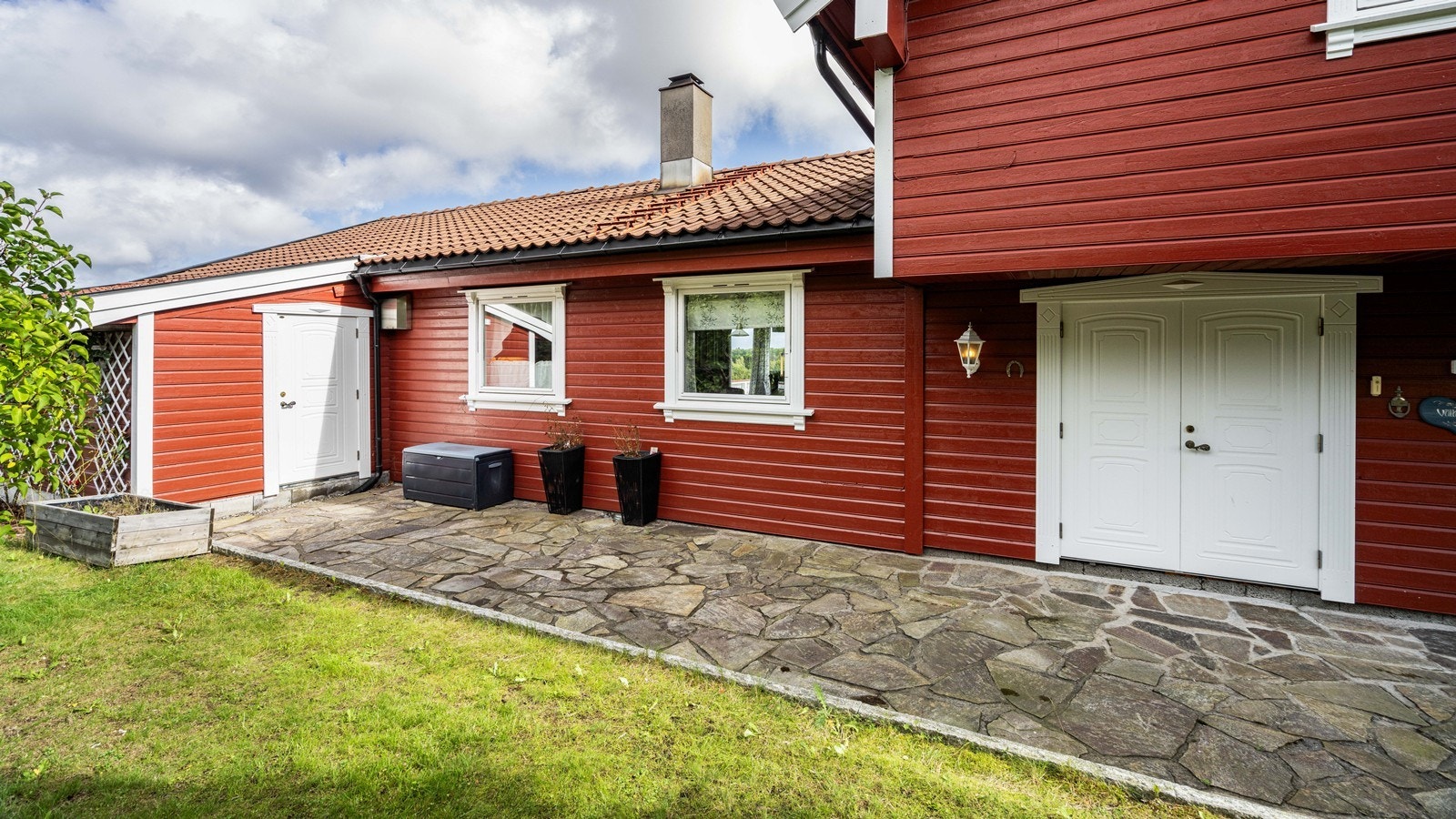 og har ett flott opparbeidet inngangsparti Galleribilde