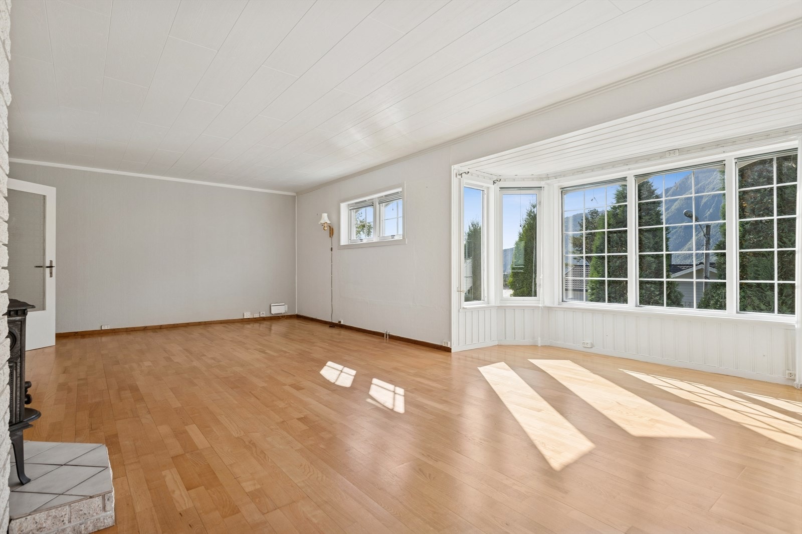 Her får du en stue som kombinerer både funksjonalitet og koselig atmosfære Galleribilde