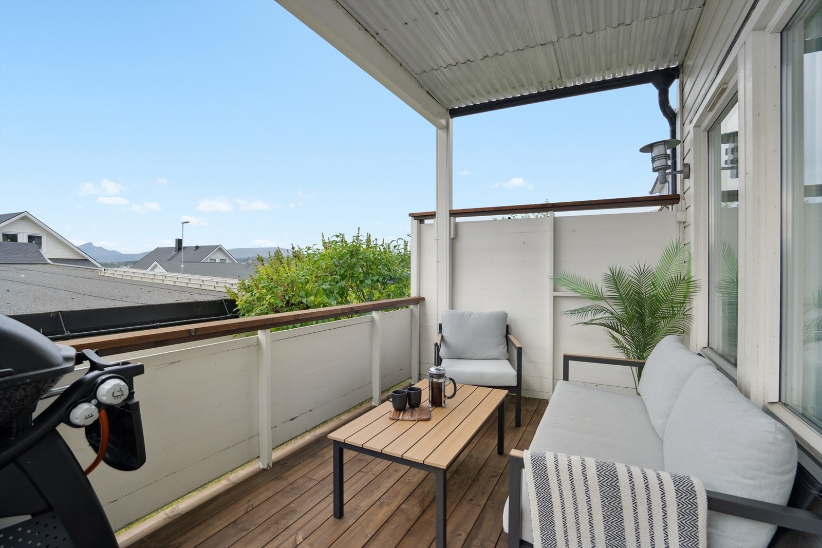 Overbygget og godt skjermet terrasse Galleribilde