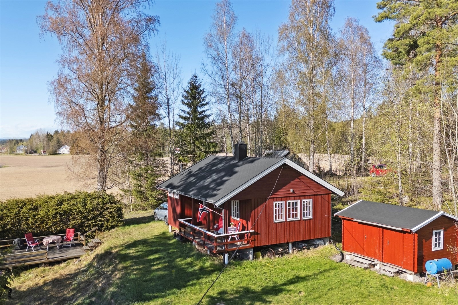 Oppfyll hyttedrømmen med denne trivelige fritidseiendommen på Tobøl! Galleribilde