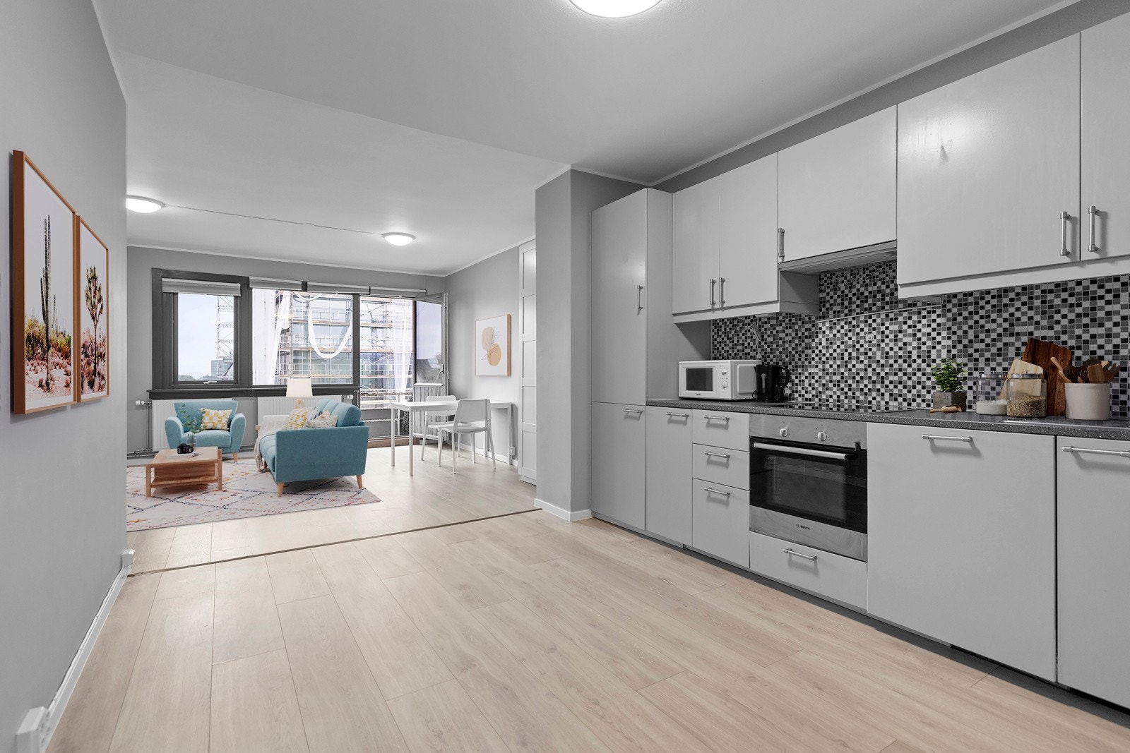 Illustrasjonsbilde fra kjøkkenet mot stuen - virtuell styling Galleribilde