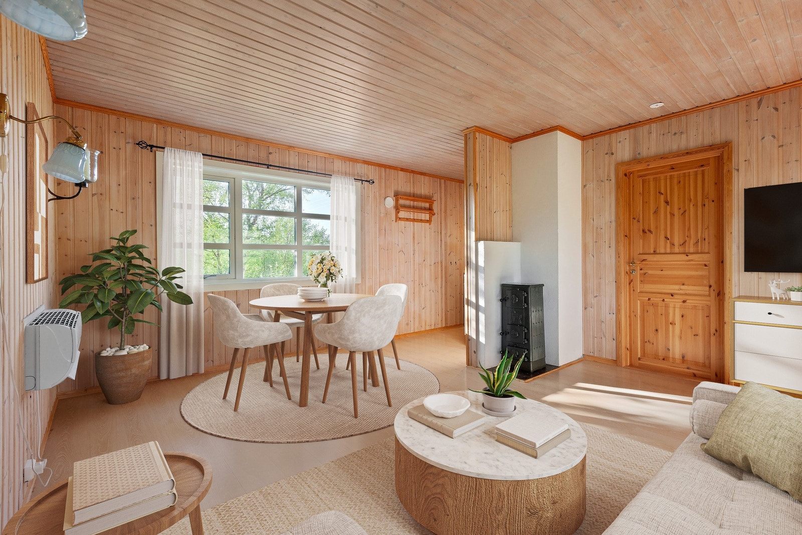 Stue og kjøkken ligger i en åpen løsning Galleribilde