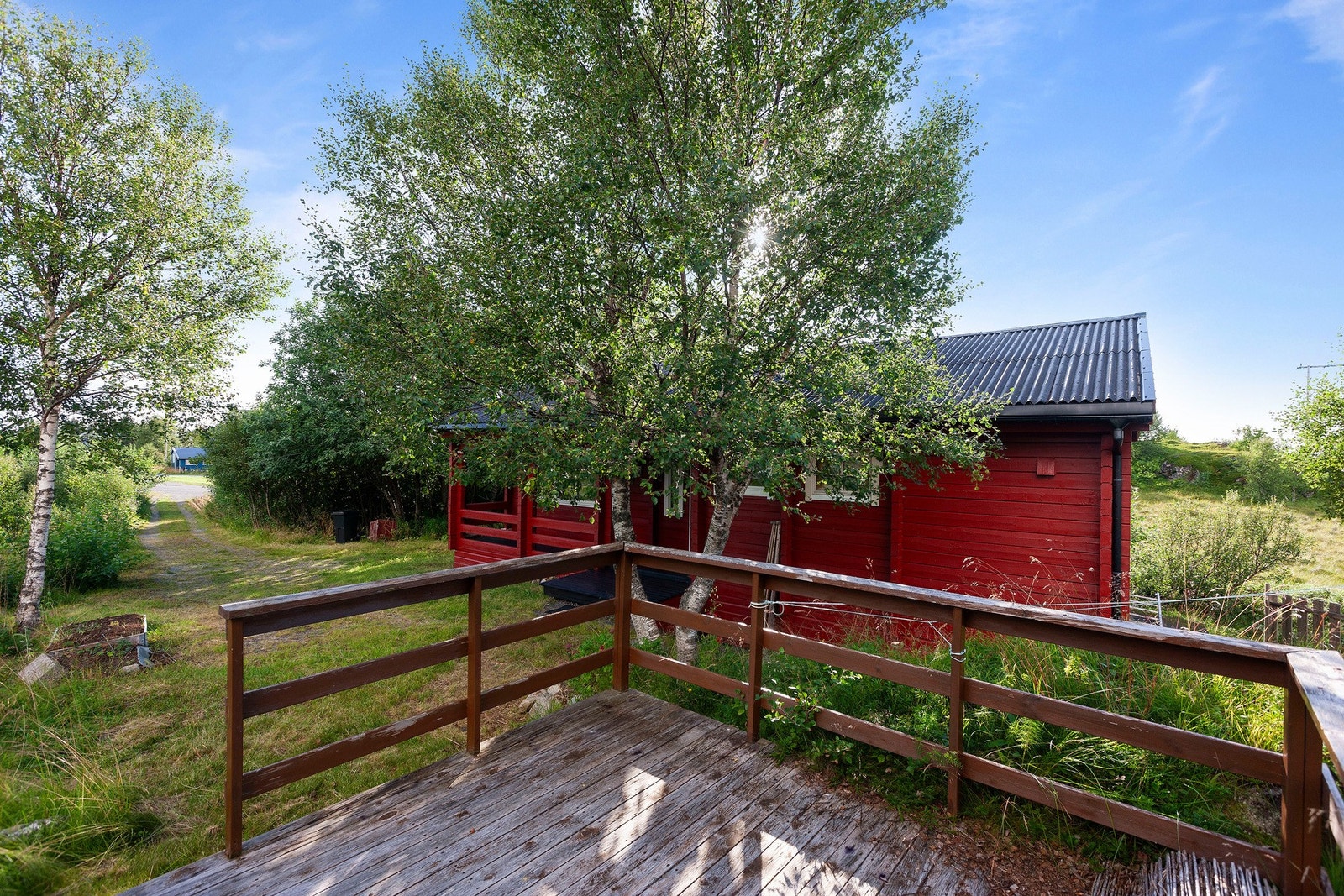 Eiendommen har en fredelig beliggenhet på Vinje Galleribilde