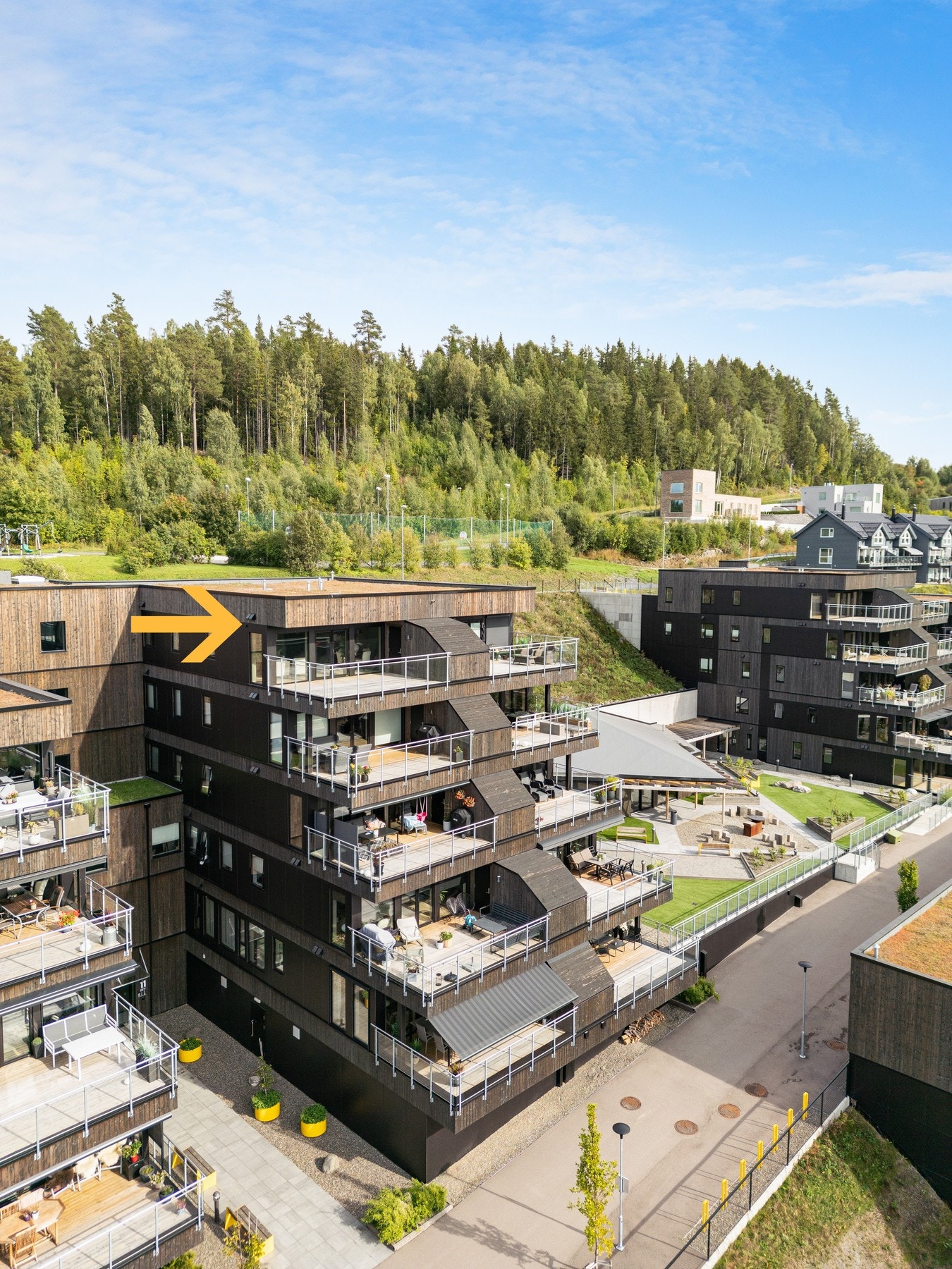 Boligprosjekt med naturnære omgivelser og umiddelbar nærhet til marka og turløyper, sommer som vinterstid. Galleribilde