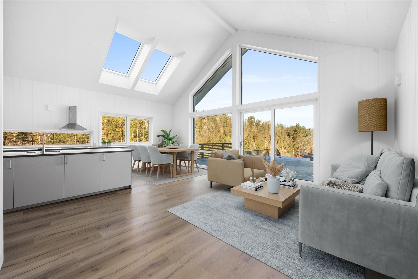 God plass for både sofagruppe og spisebord, med utgang til terrassen via skyvedør. Bildet er digitalt illustrert. Galleribilde