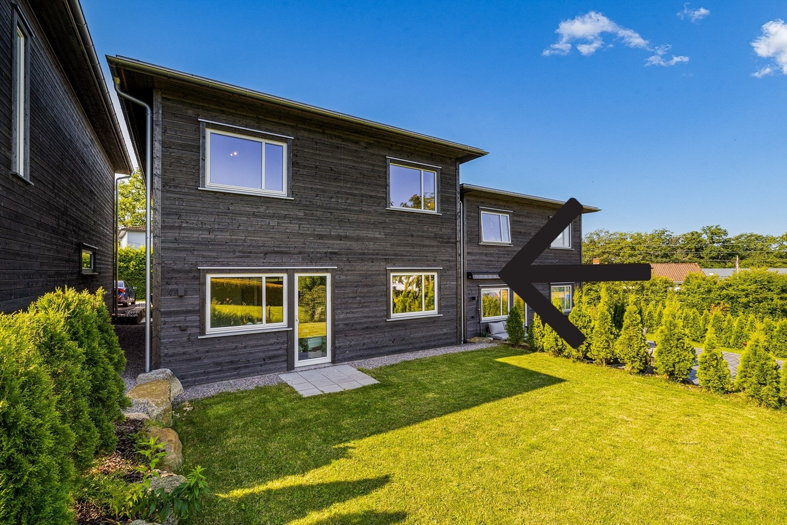 Praktisk hage på baksiden av huset. Galleribilde