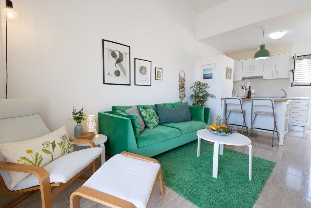 Hyggelig stuegruppe og åpen kjøkkenløsning Galleribilde