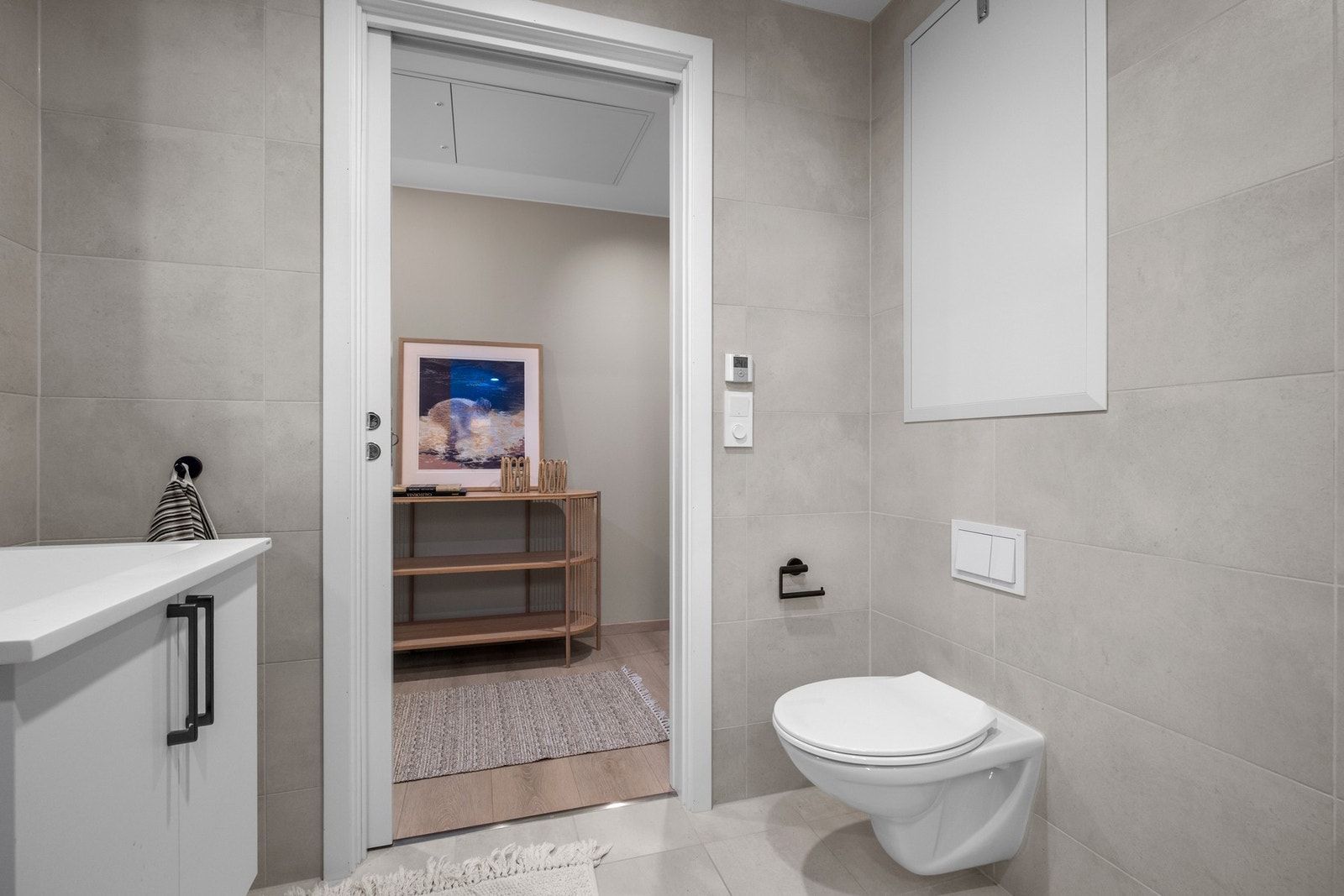 Delikat flislagt bad på 4,3m². Galleribilde