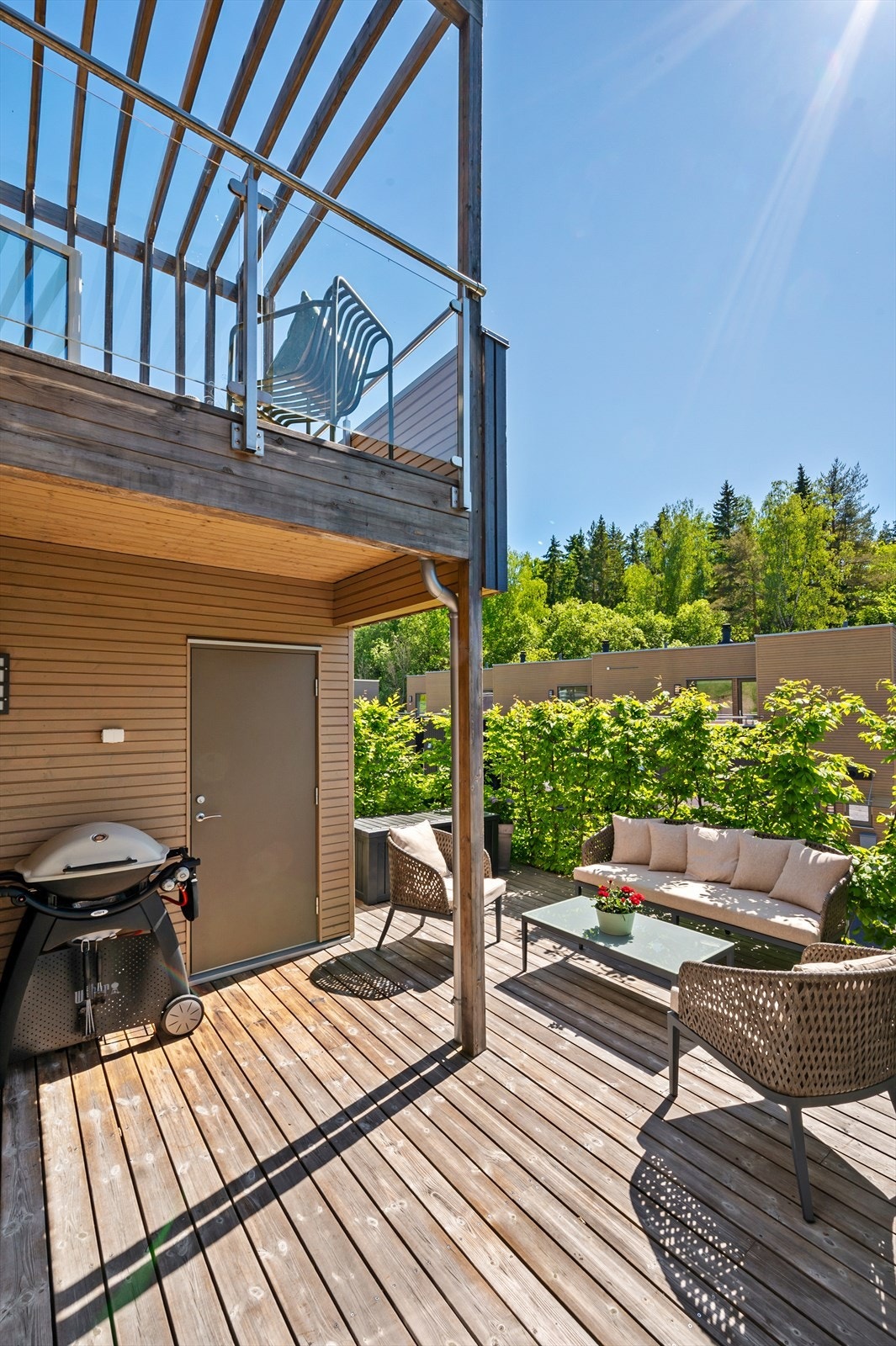 Boligens terrasse disponerer egen bod på 6m². Galleribilde