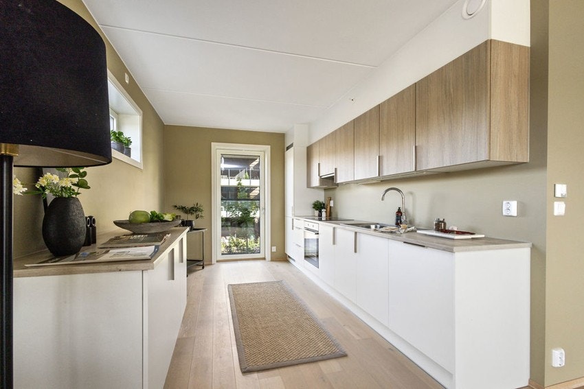 Kjøkkeninnredning fra Crown kjøkken med integrerte hvitevarer. Galleribilde