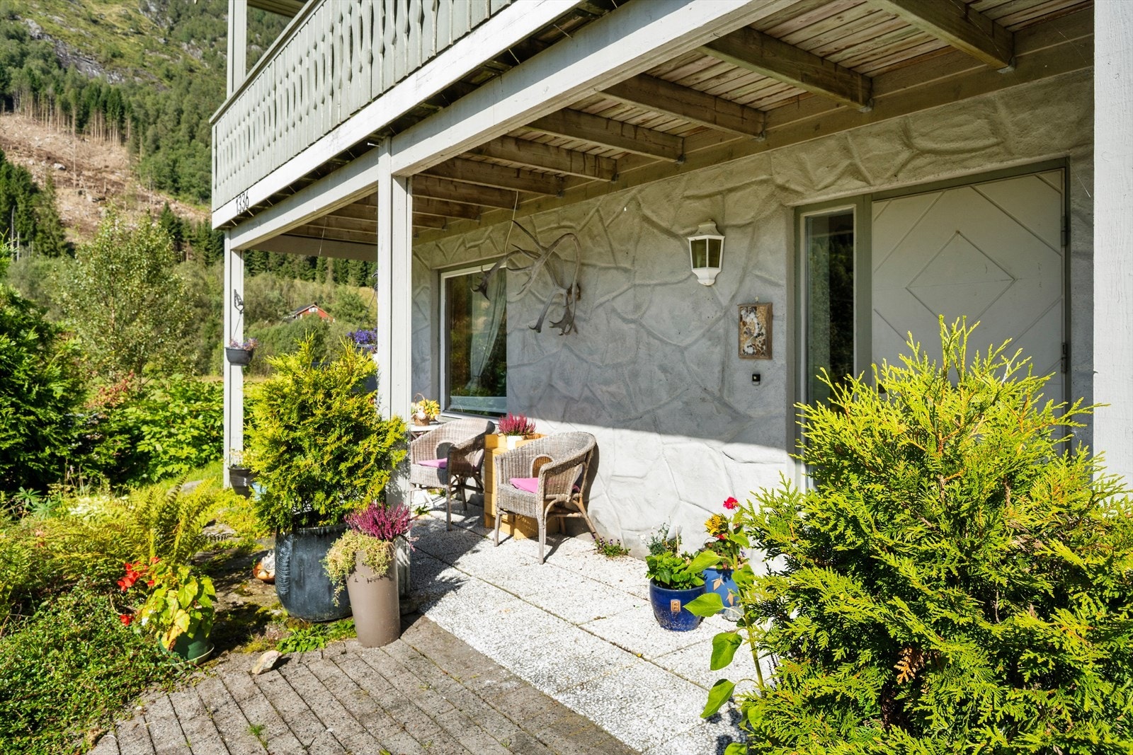 Flott steinlagt inngangsparti. Galleribilde