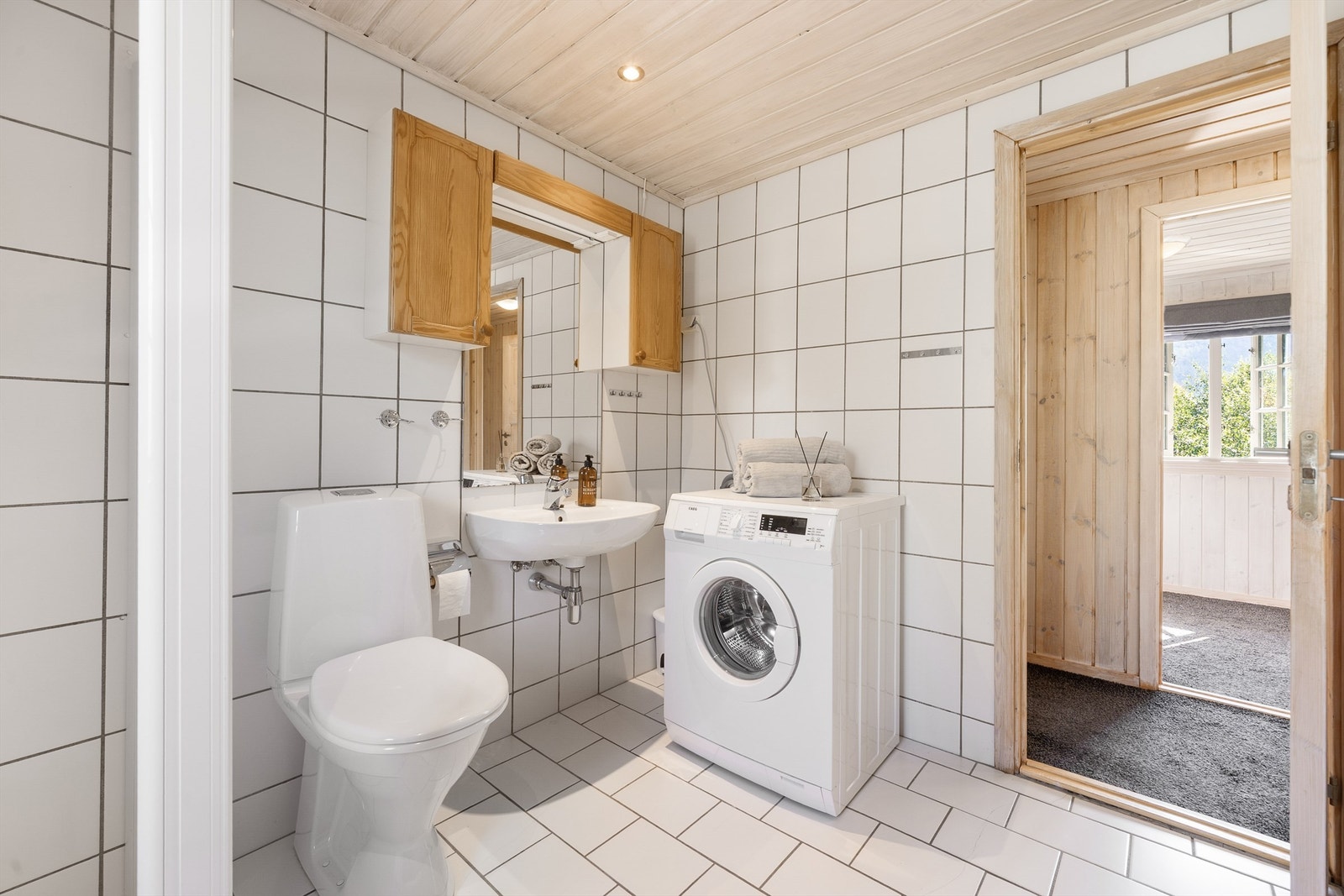 Badet har opplegg for vaskemaskin. Galleribilde