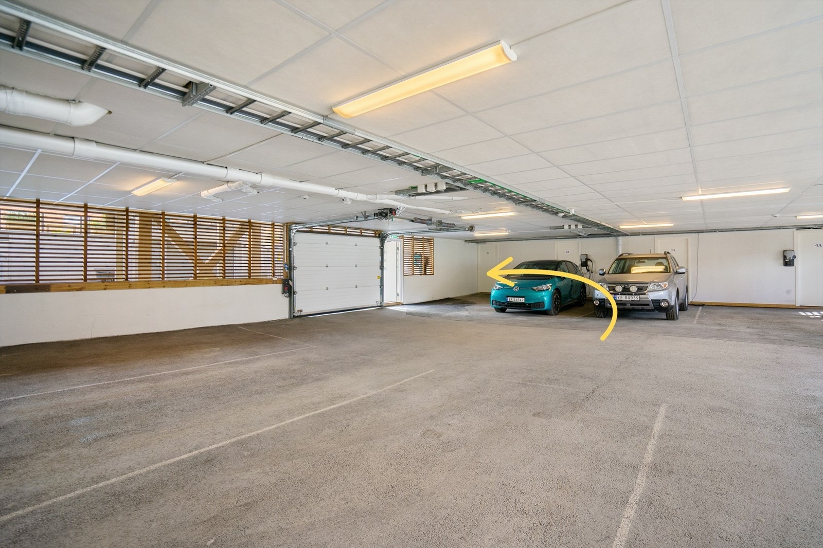 Leiligheten har egen parkeringsplass i parkeringsgarasje Galleribilde