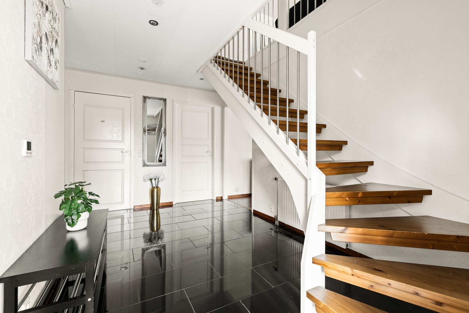 Vi tar trappene opp til hjemmets loftetasje. Galleribilde