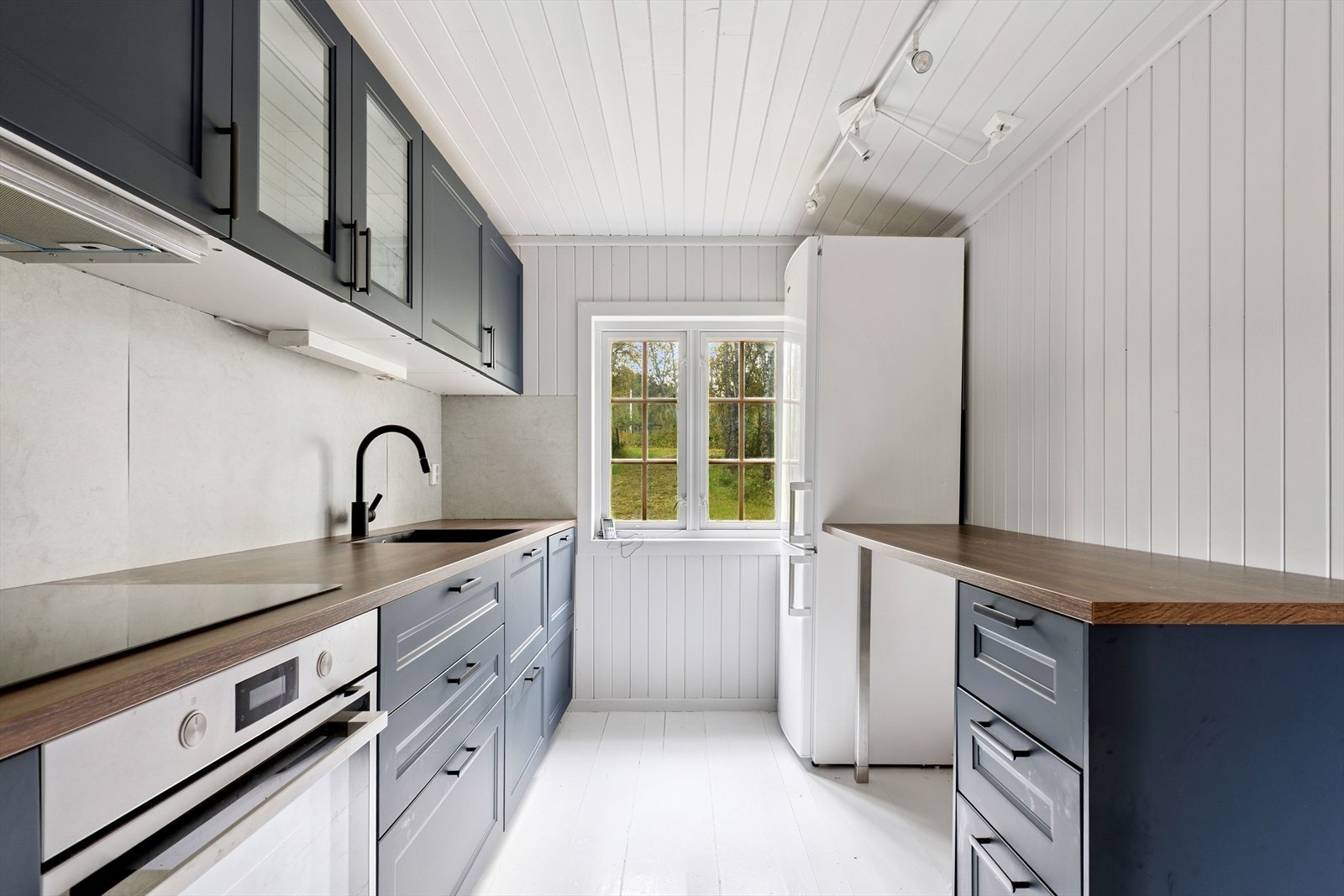 Her er det mekanisk avtrekksvifte over stekesonen. Galleribilde