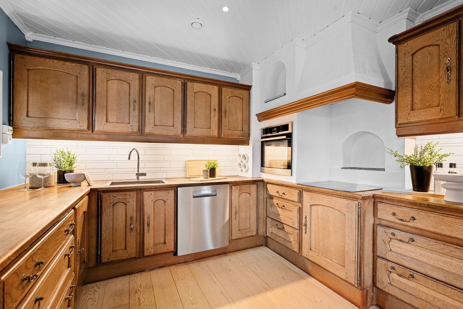 Et kjøkken som kombinerer stil og funksjon - godt tilrettelagt for hele familien. Galleribilde