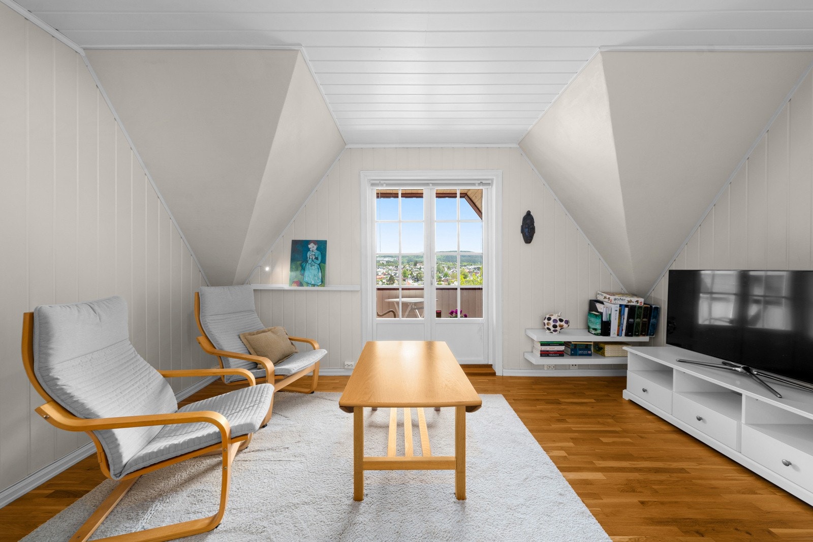 Loftstue med utgang til hyggelig veranda Galleribilde