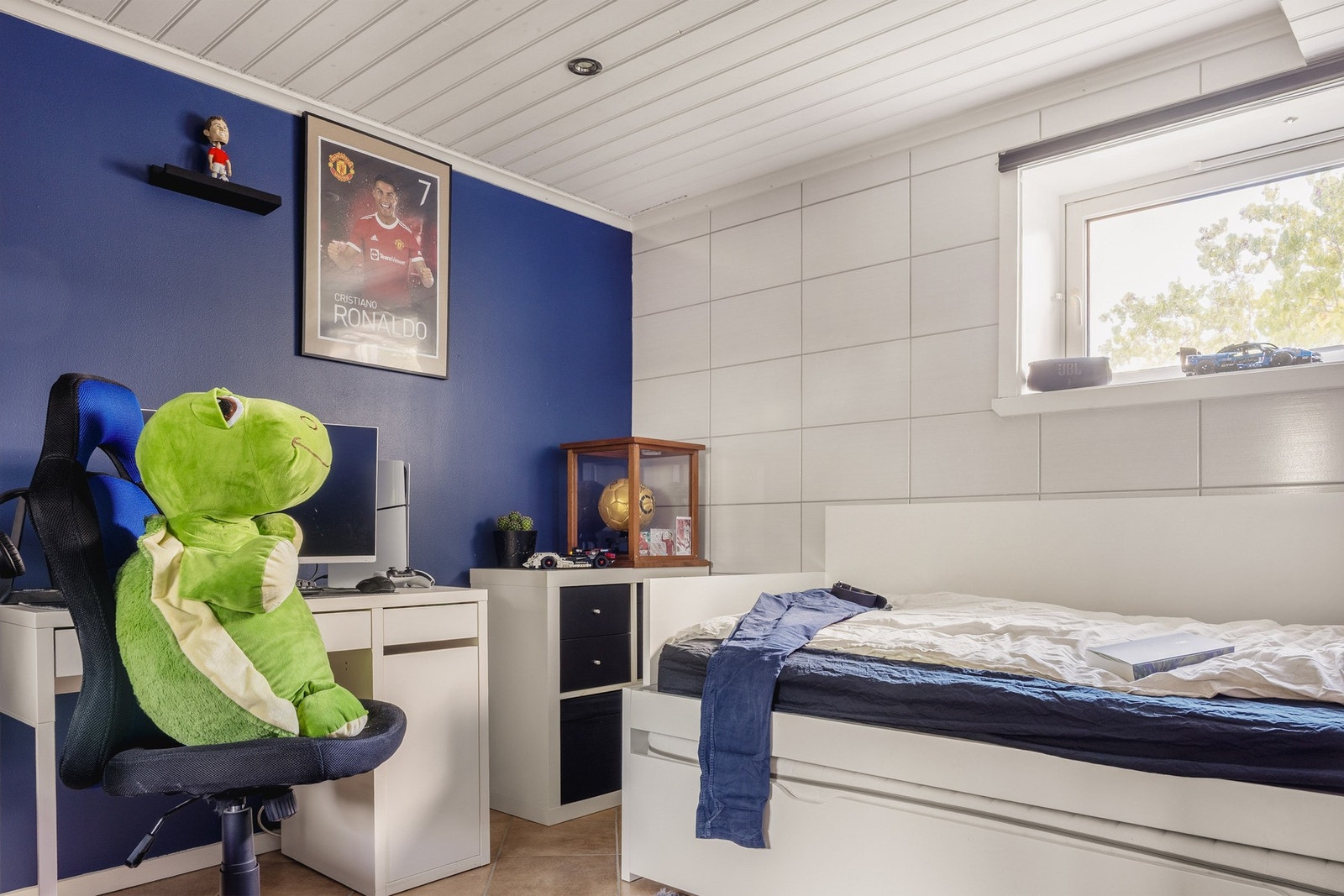 Det tredje soverommet er på cirka 9,3 m² og kan brukes som barnerom, kontor eller gjesterom. Galleribilde