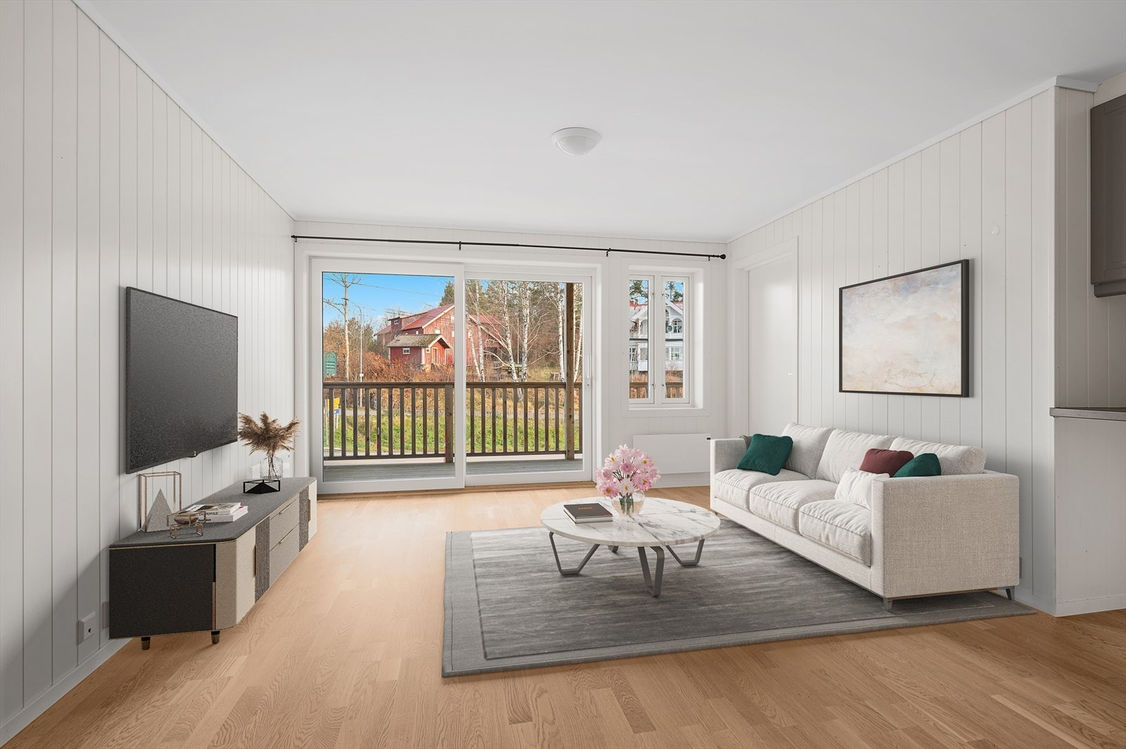 Flott stue med skyvedør ut til veranda med store vindusflater (bildet er digitalt stylet) Galleribilde