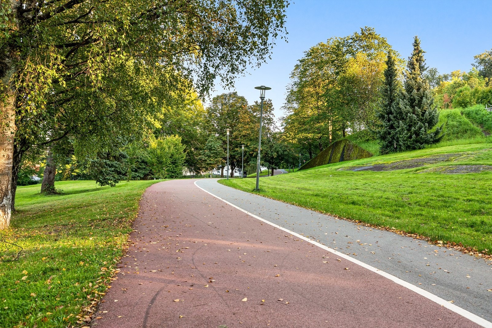 Umiddelbar nærhet til flotte tur- og sykkelstier både internt på Strømsø og langs elvepromenaden Galleribilde