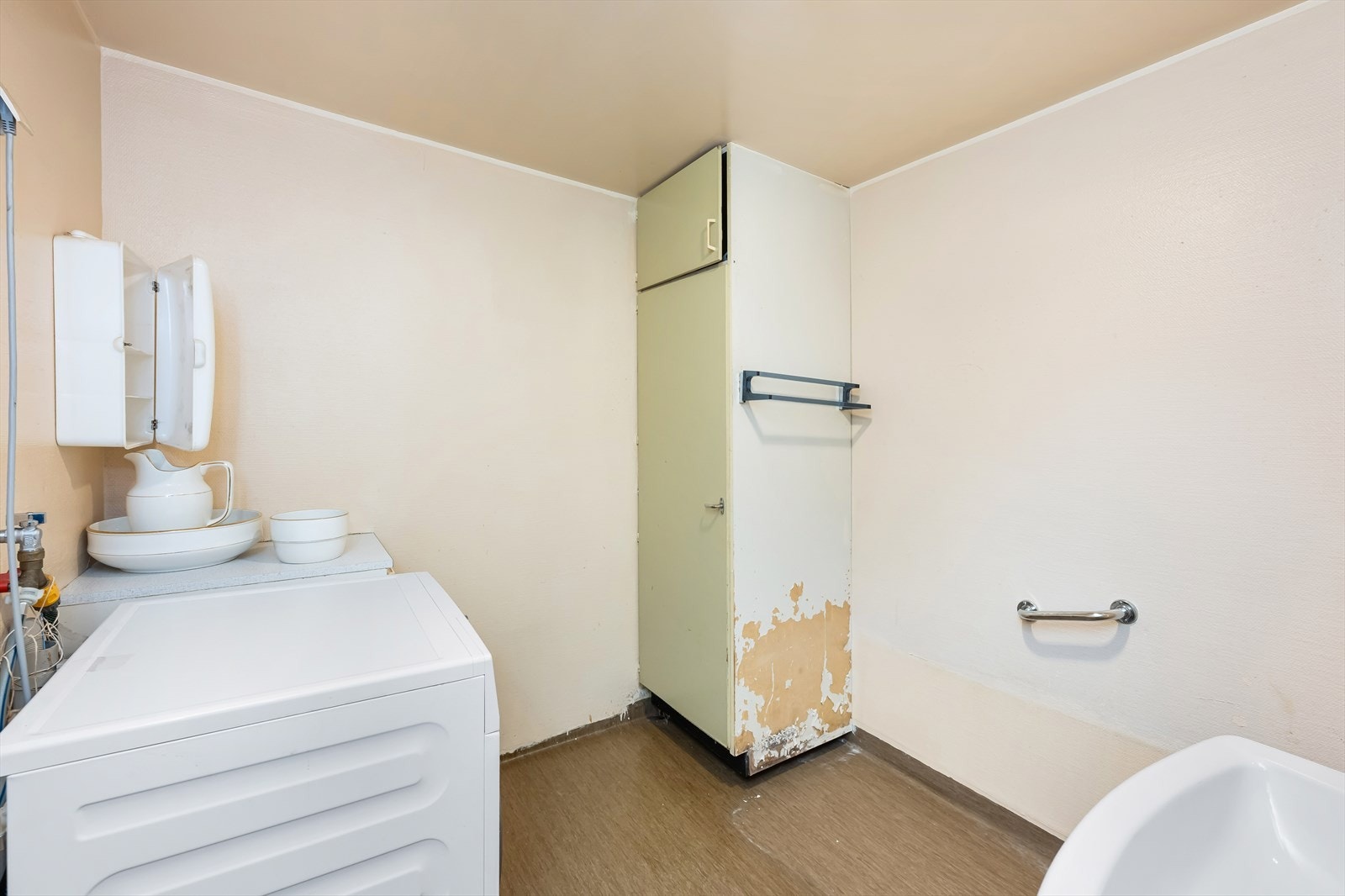 Uttak for vaskemaskin på bad. Galleribilde