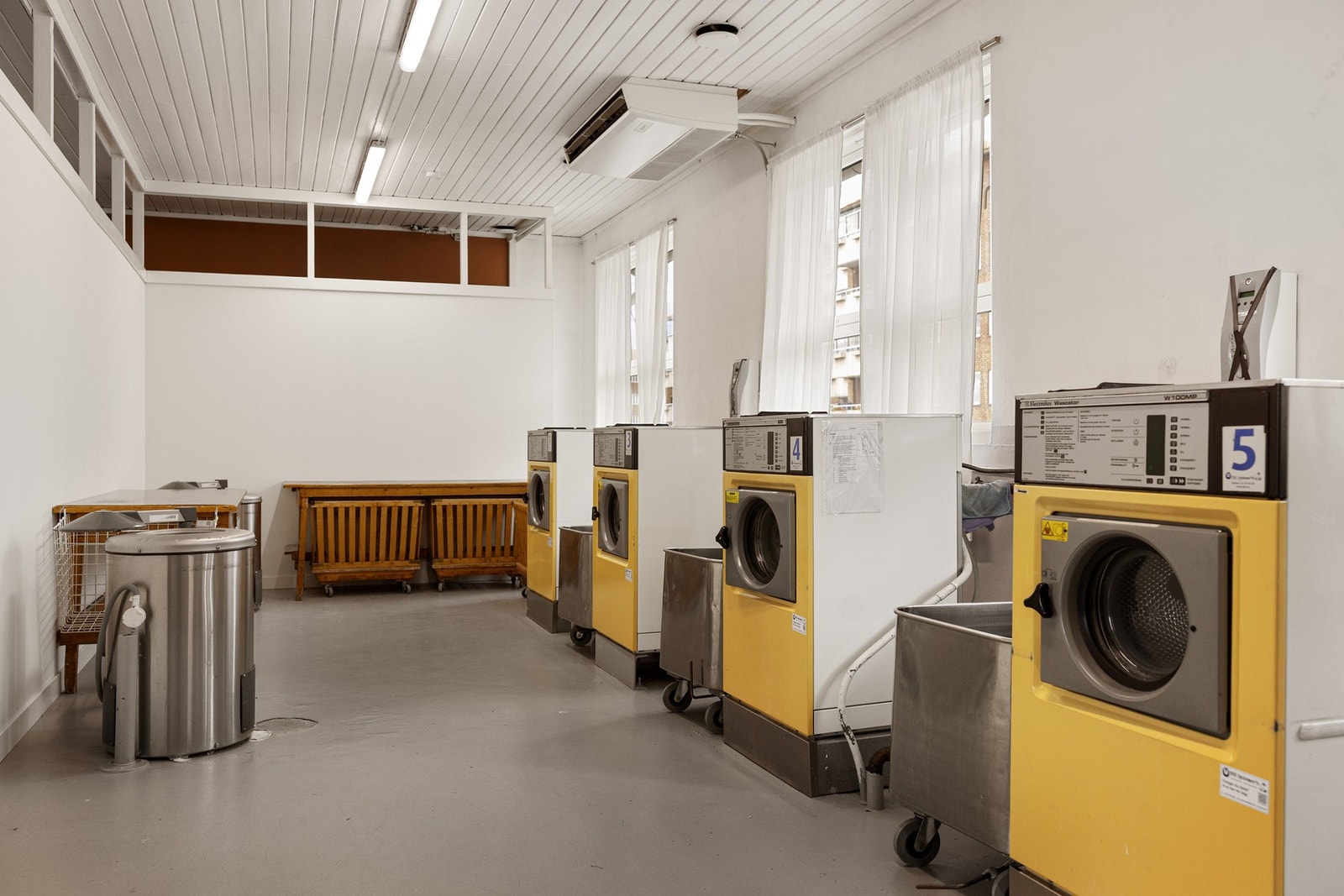 Fellesvaskeri og treningsrom som kan benyttes av beboerne. Galleribilde