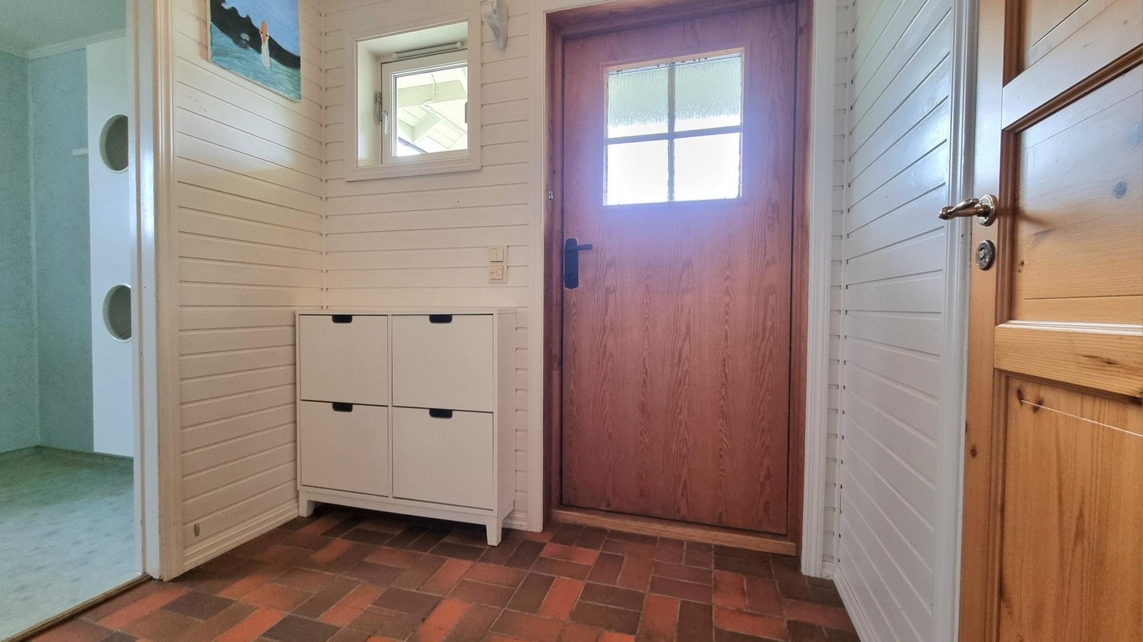 Flislagt entre med praktisk varme i gulv Galleribilde