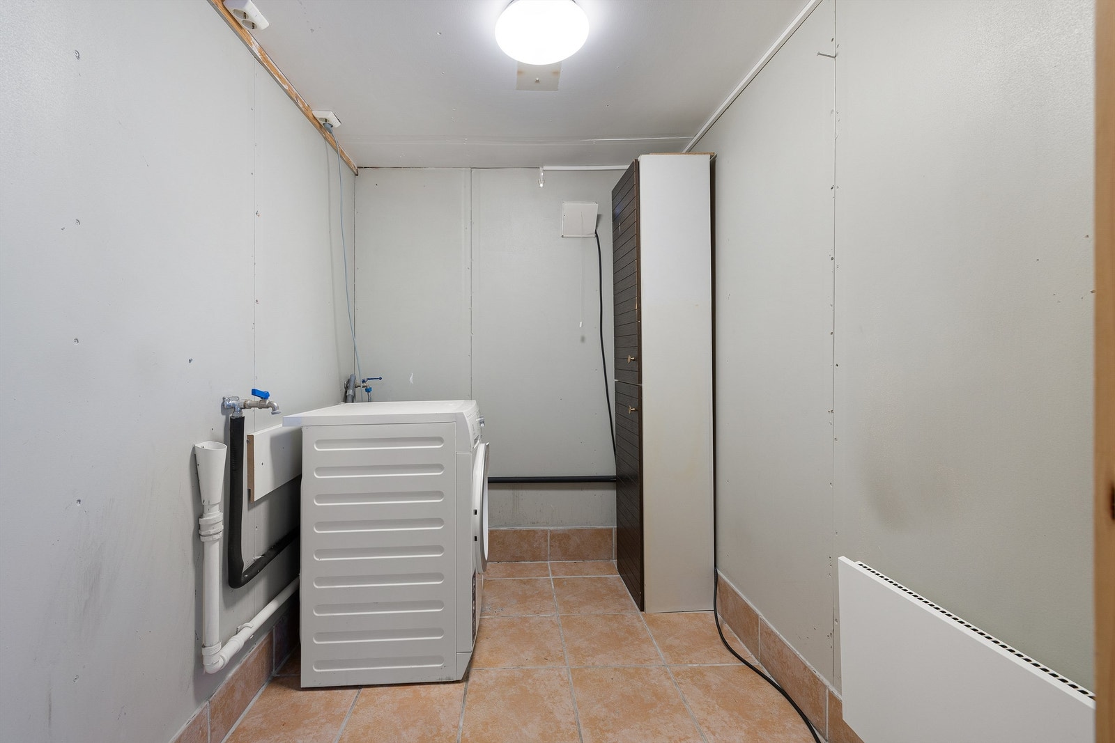 Felles vaskerom i kjeller. Galleribilde