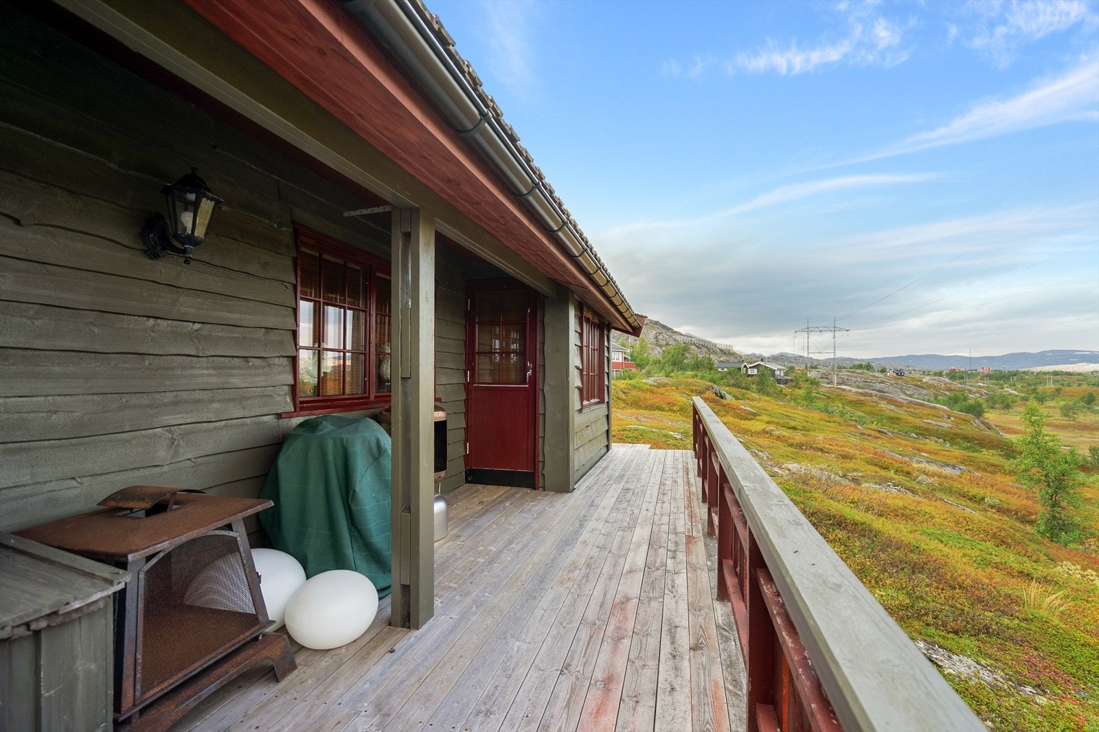 Overbygd del av terrassen med utgang fra stue Galleribilde