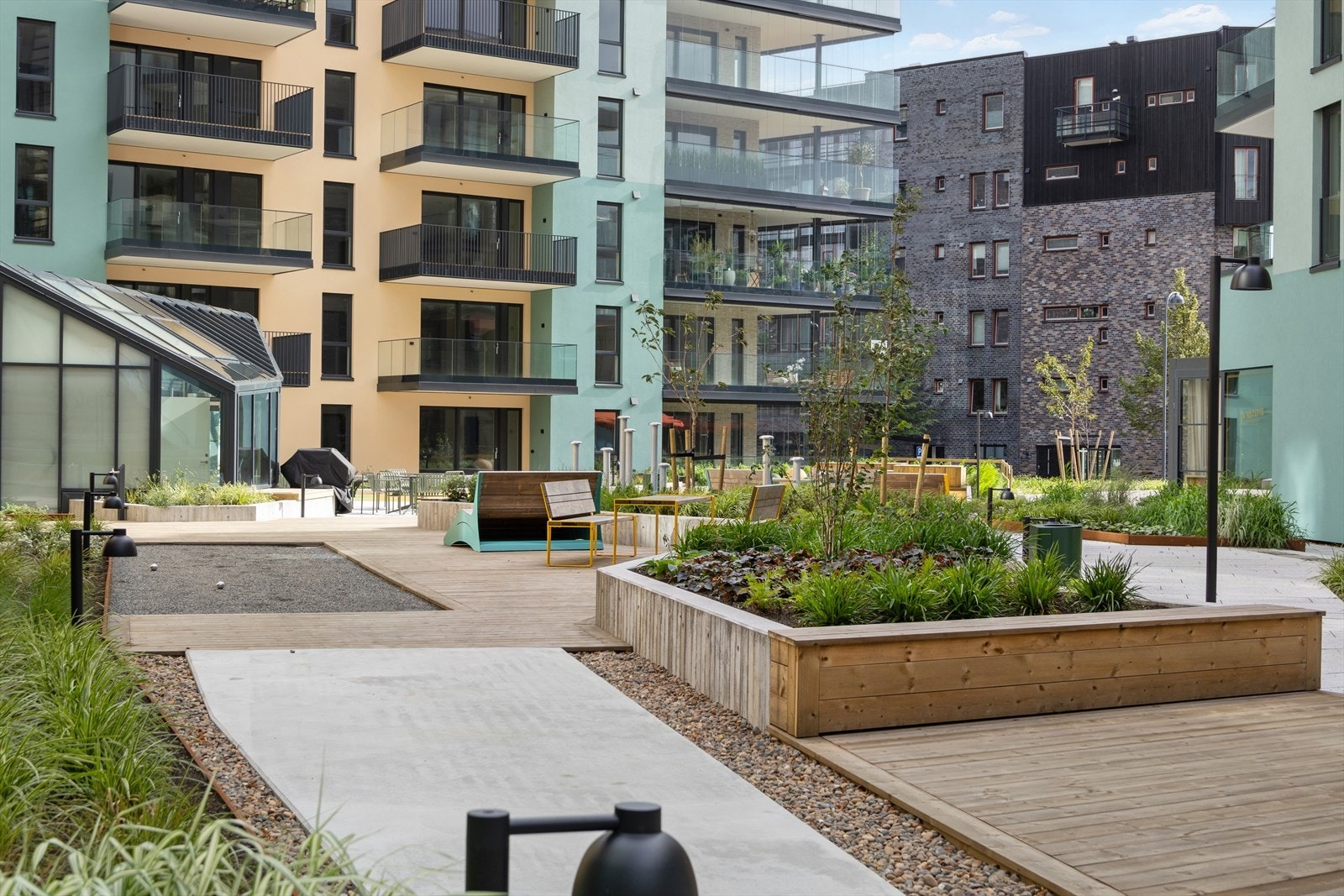 Det er utviklet som et nytt, urbant sentrum med både boliger og næring. Galleribilde