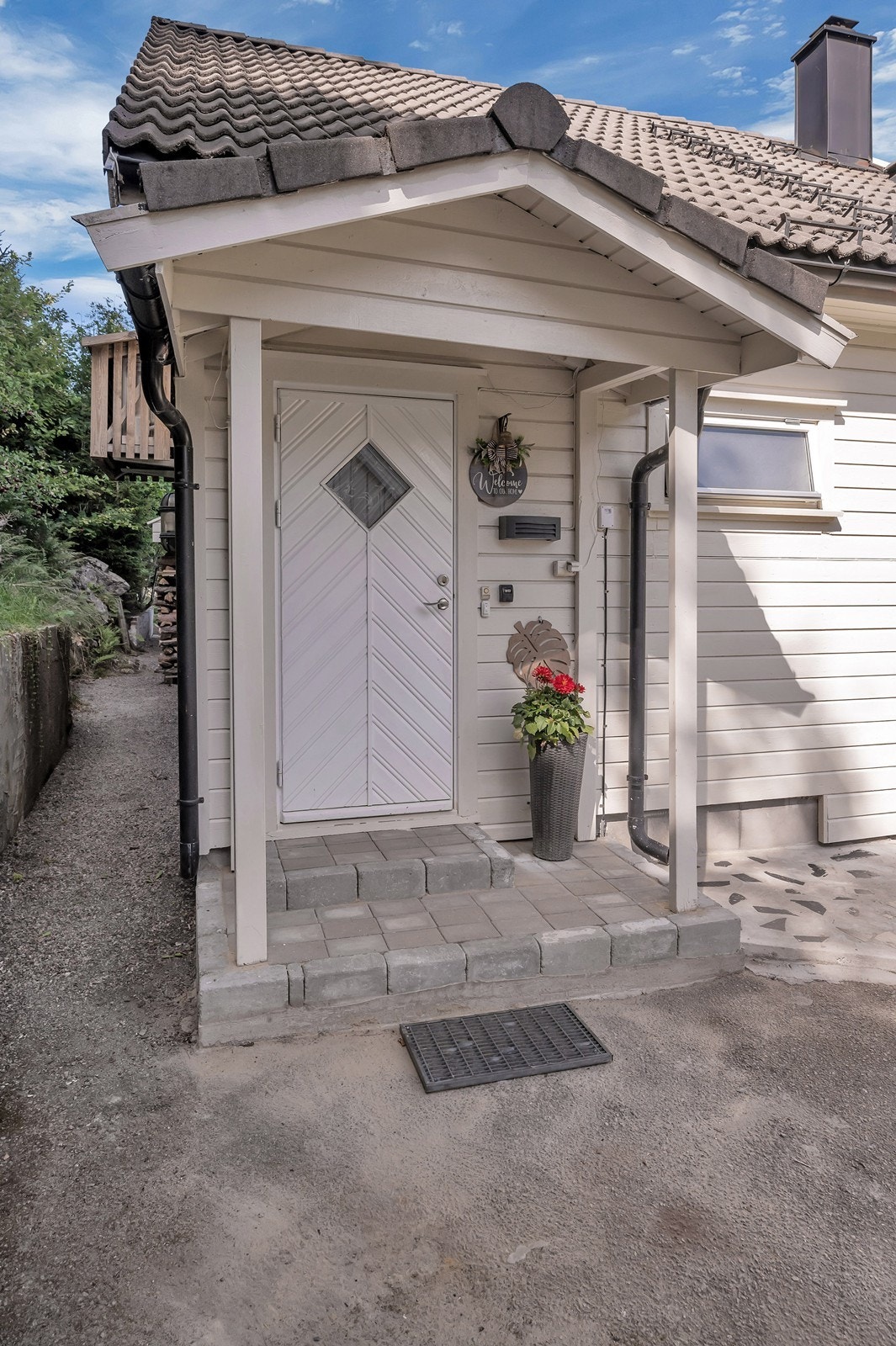 Pent overbygd inngangsparti Galleribilde