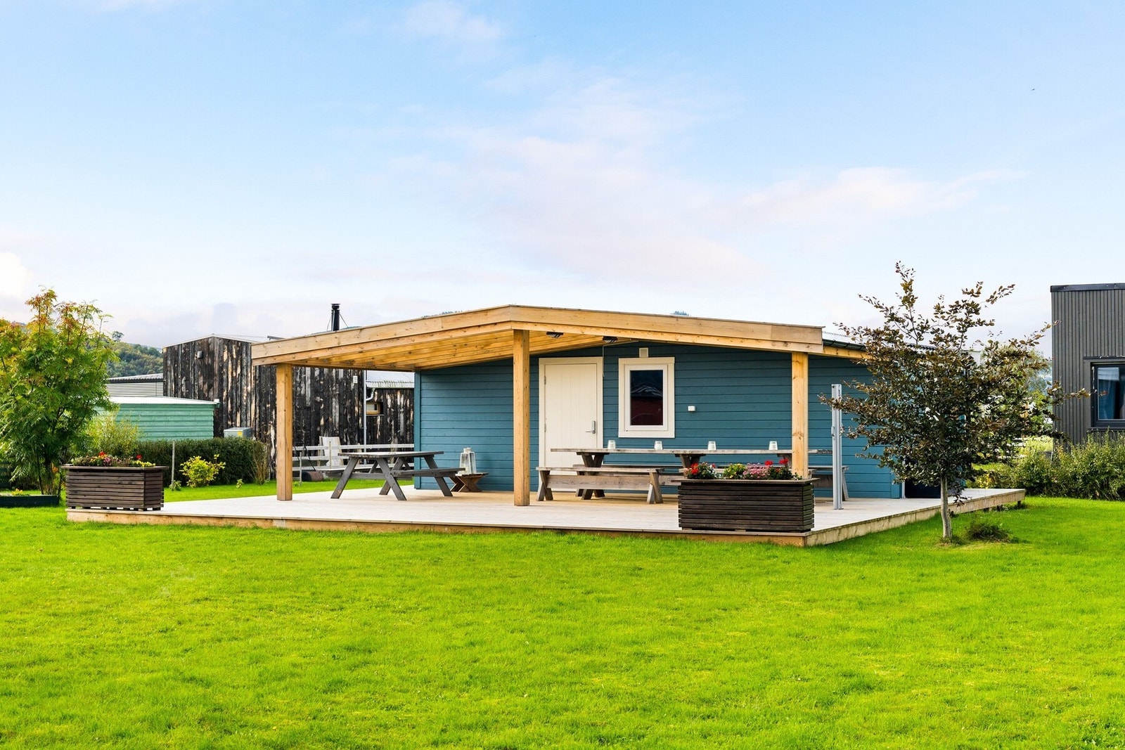 Kolonihagen har et innbydende fellesområde med flere aktiviteter gjennom vår- og sommersesongen. Galleribilde