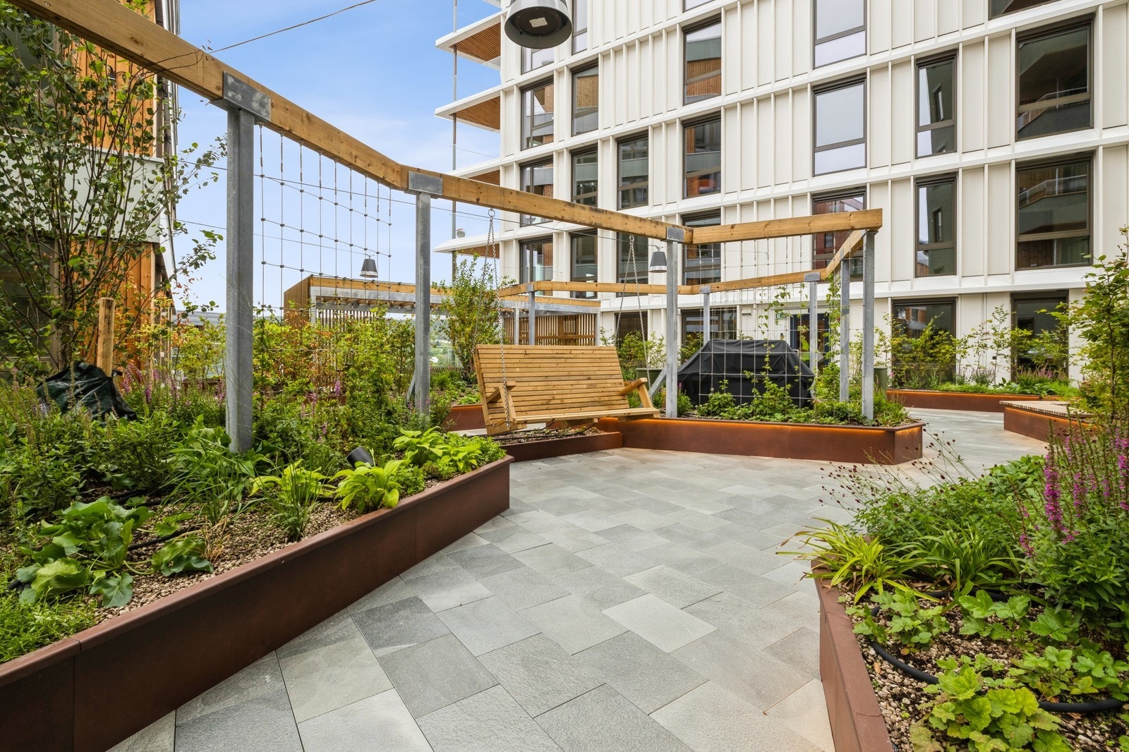 Det er lekre skjermede fellesområder for beboerne. Galleribilde