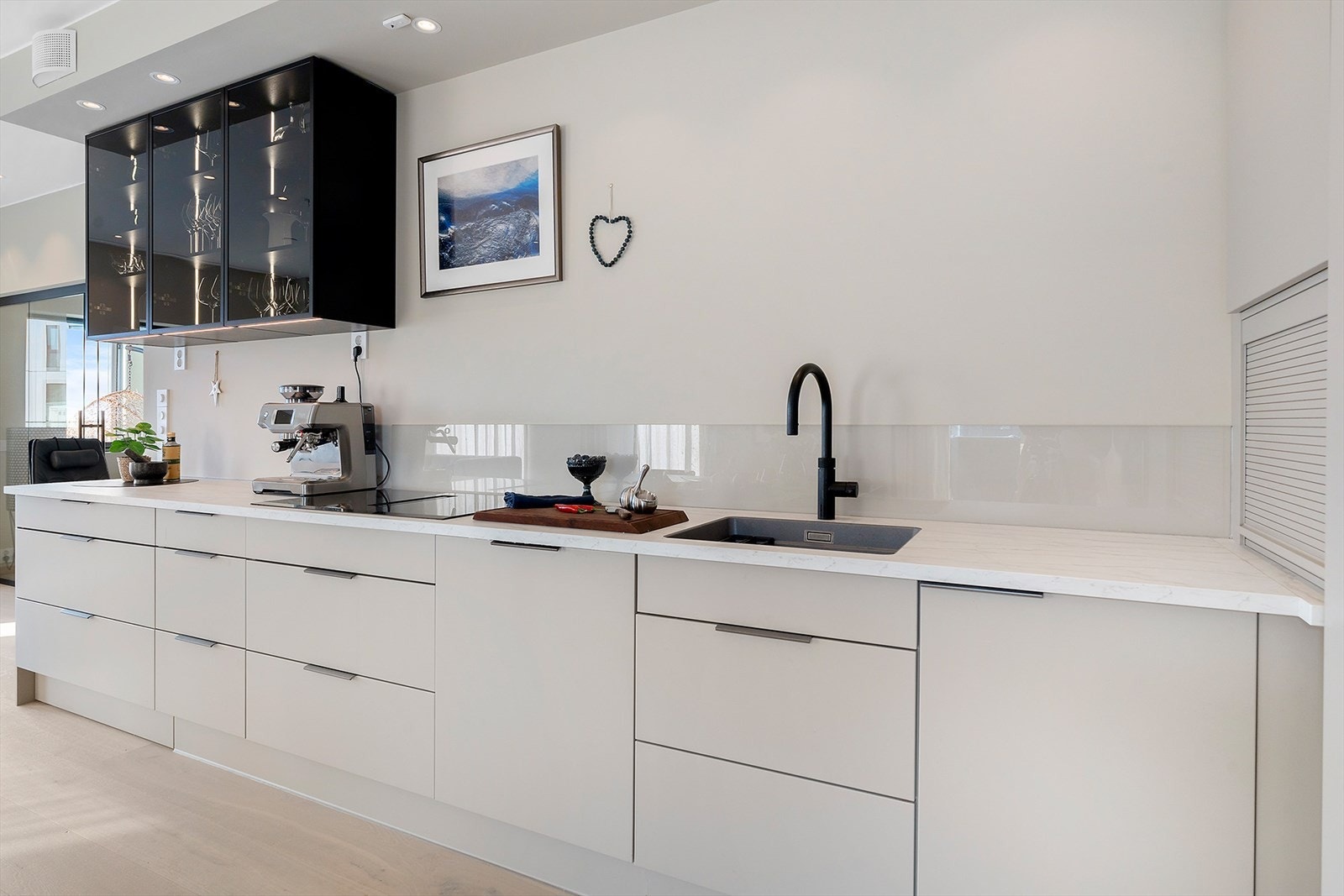 Integrert kjøkkenventilator i koketoppen. Quooker gir deg kokende vann i kjøkkenkrana Galleribilde