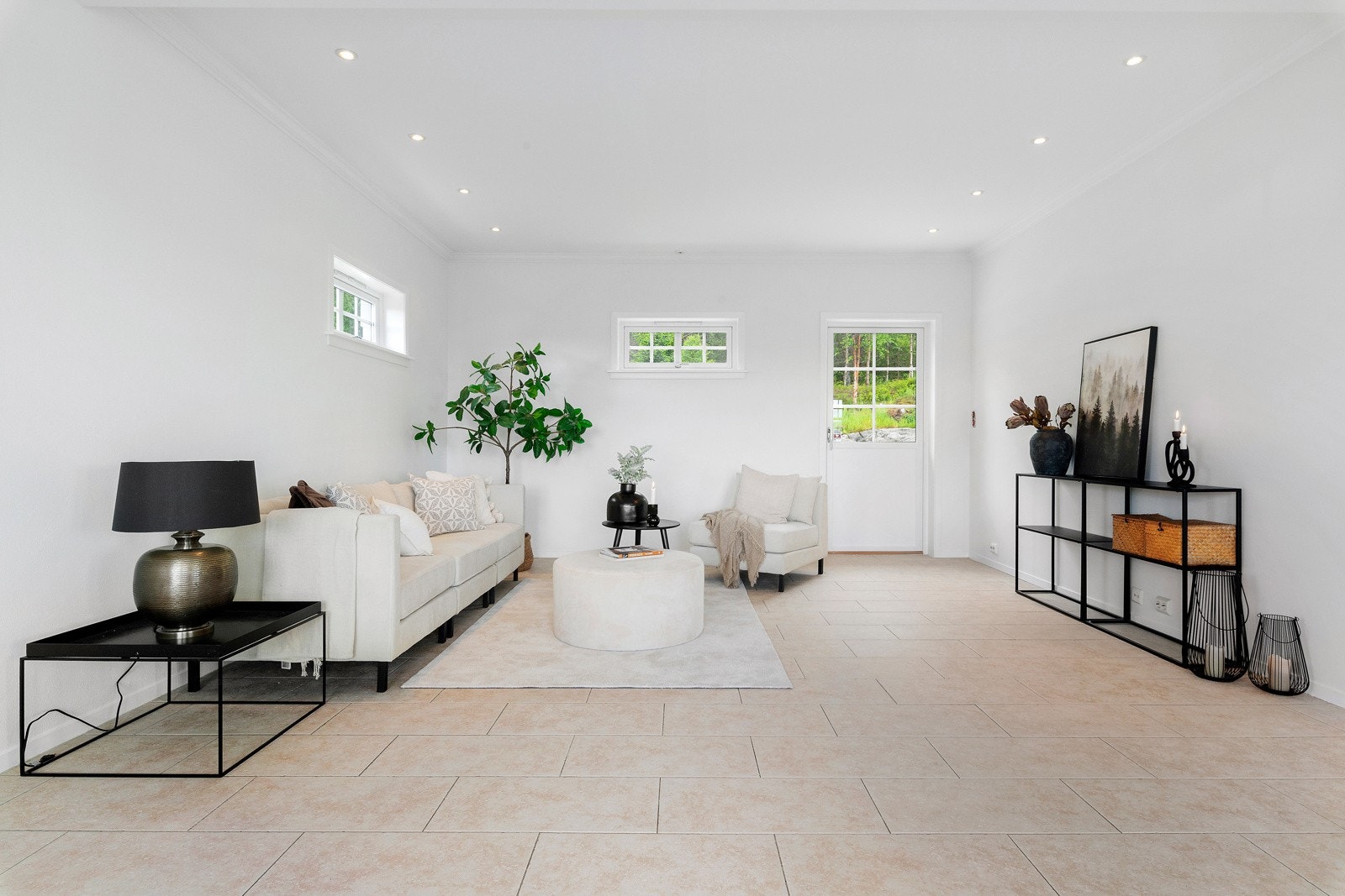 Her er det god plass til hele familien kan samles foran TV-en. Galleribilde