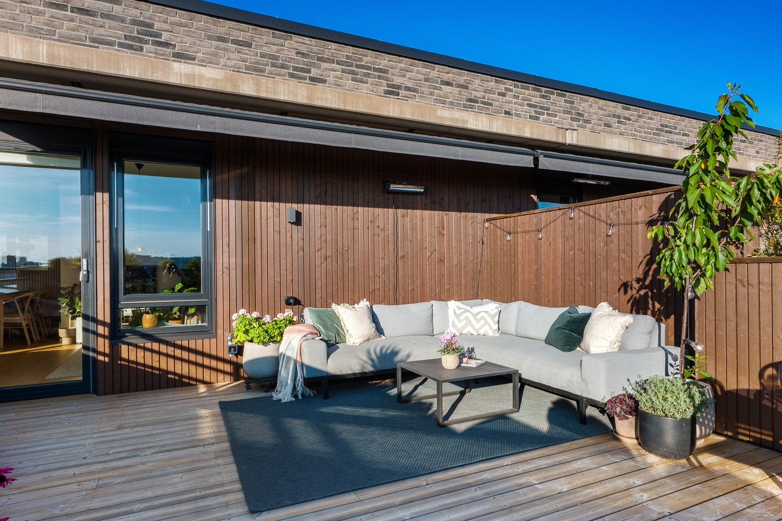 Her kan du tilberede mat og drikke i friluft, samtidig som du er vertskap for familie og venner. Galleribilde