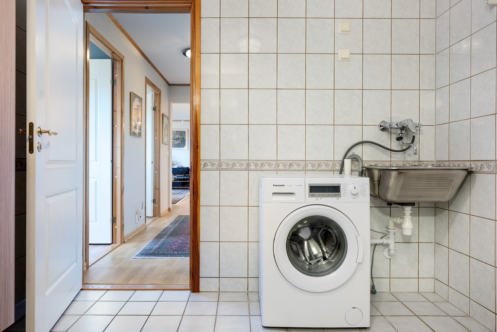 Badet har opplegg for vaskemaskin. Galleribilde