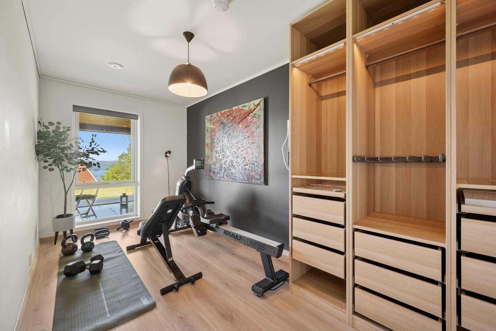 Et av soverommene brukes som treningsrom. Galleribilde