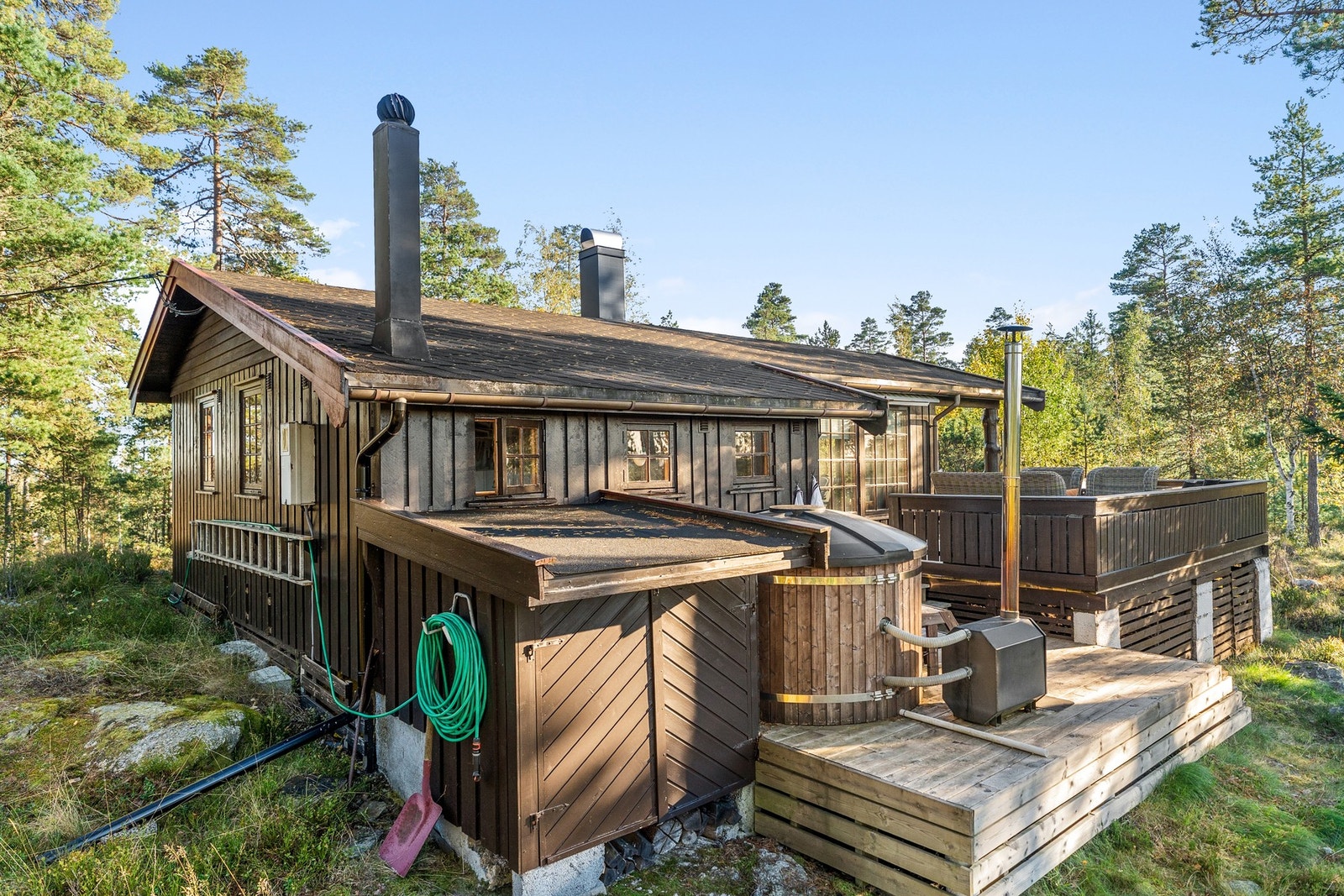 Bod på bakkeplan i tilknytning til verandaen. Galleribilde