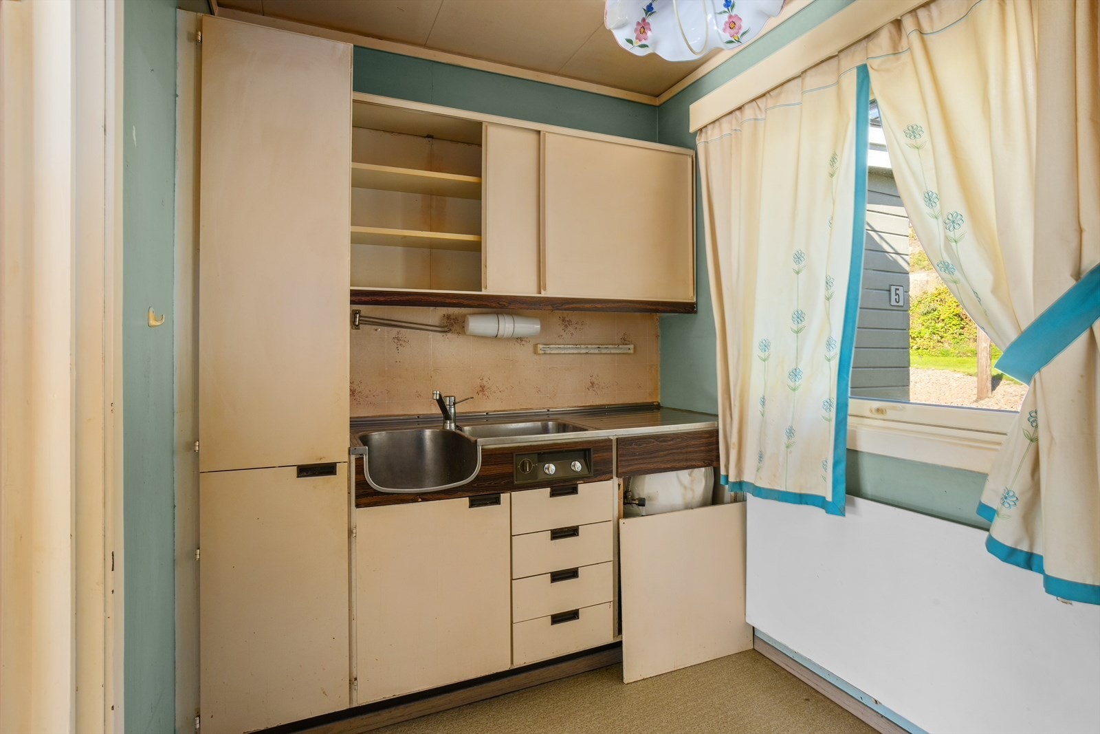 Kjøkkenet har et oppgraderingsbehov. Galleribilde