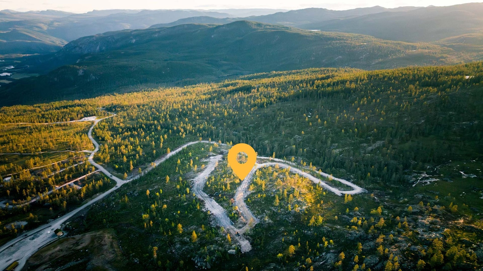 Dronefoto over tomtefeltet Galleribilde