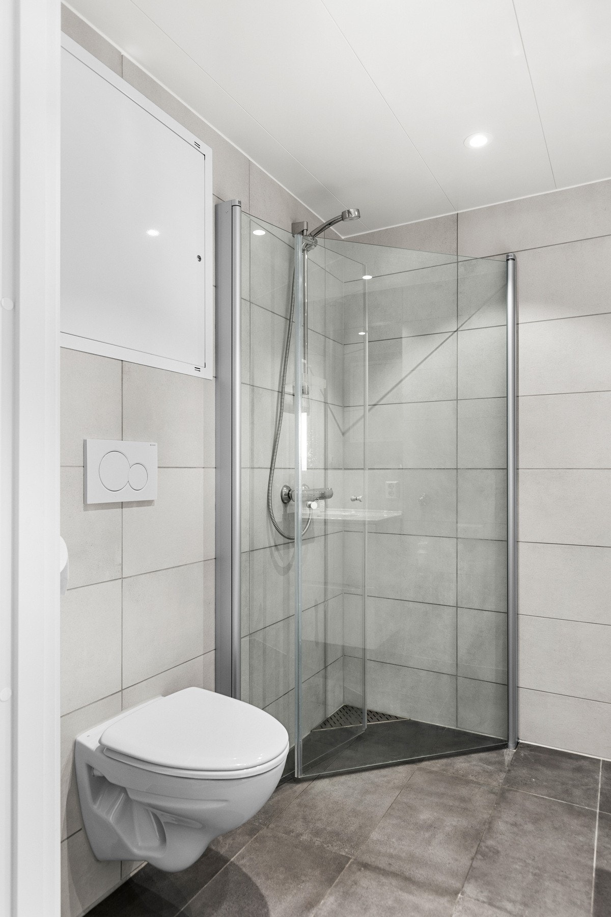 Flislagt bad med gulvvarme. Galleribilde