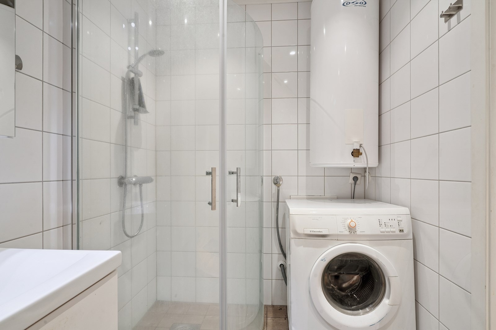 Det er plass til vaskemaskin. Galleribilde