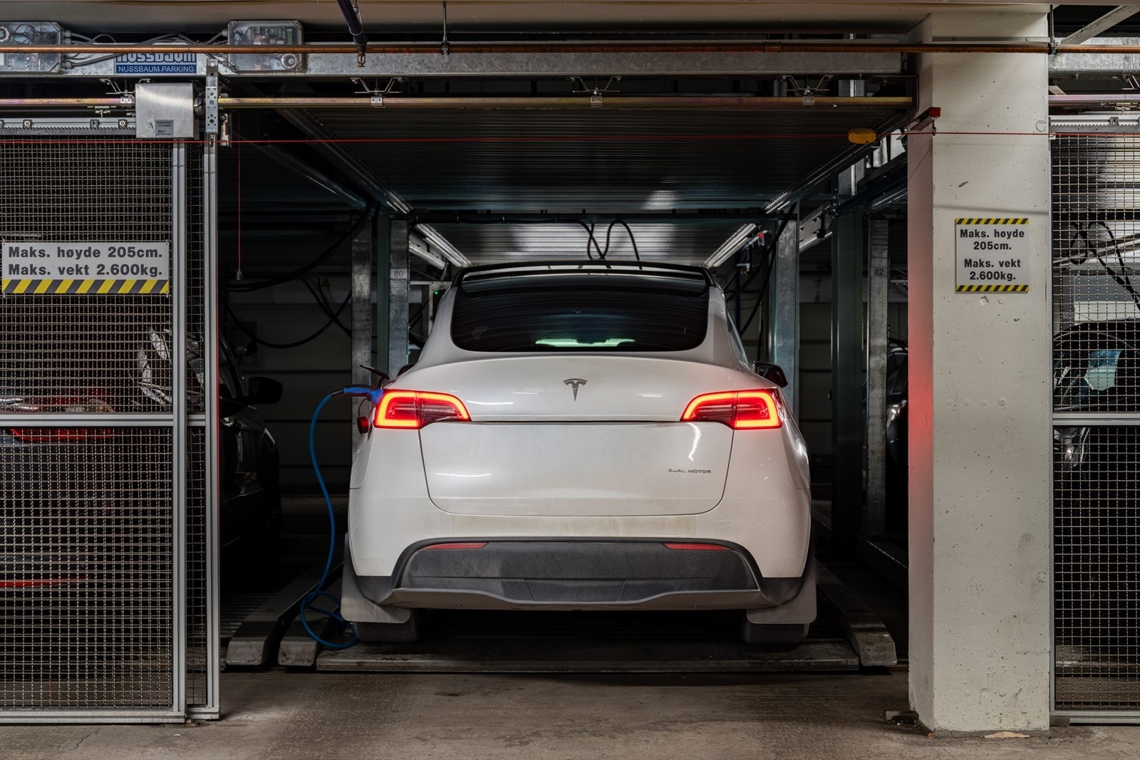 Garasjeplass, nummer 80, med elbil-lader i avlåst parkeringsanlegg medfølger. Galleribilde